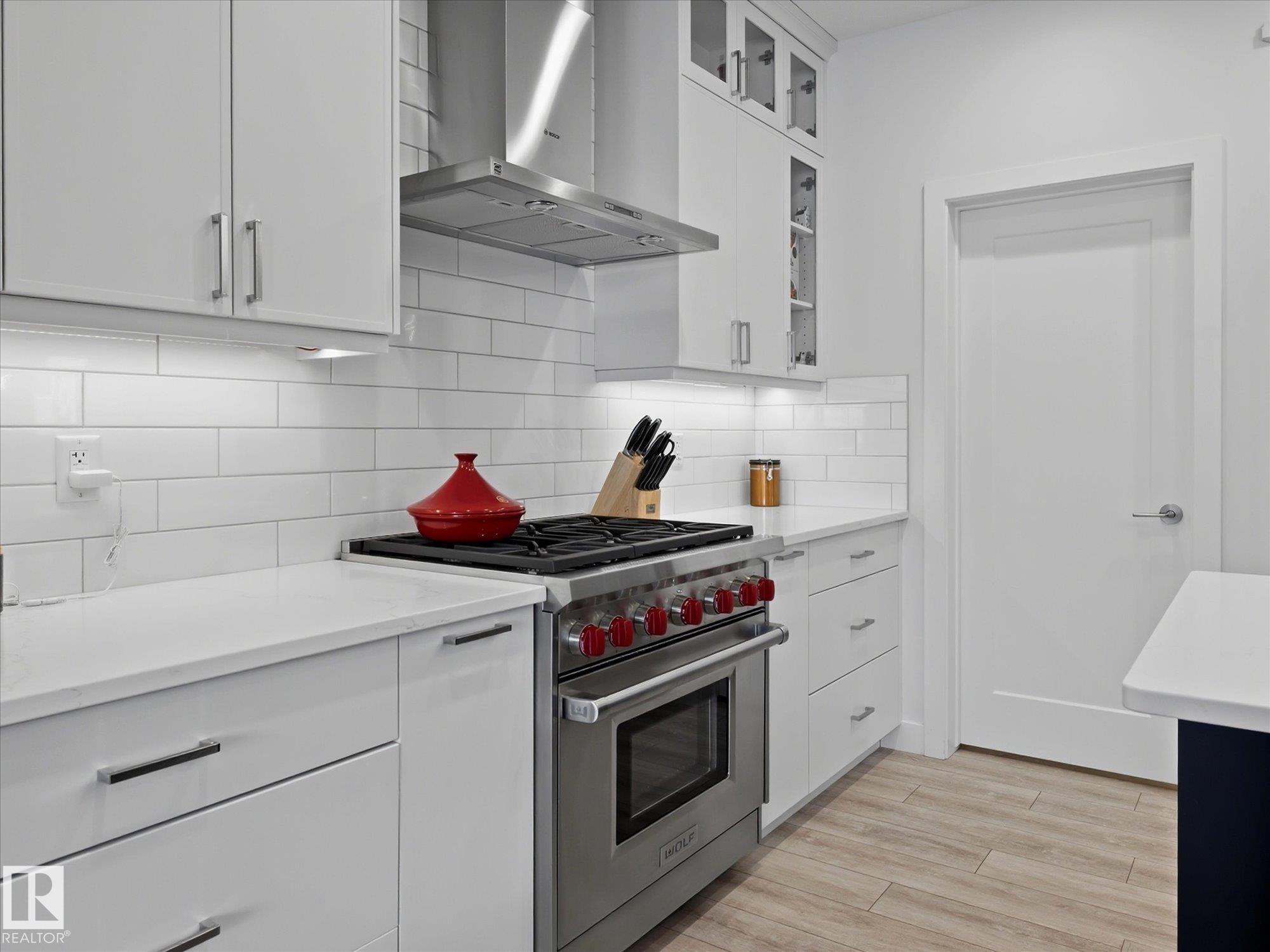 This gorgeous Wolf Stove has never been used. - 1562 Howes Place, Edmonton, AB - Indoor Photo Showing Kitchen With Upgraded Kitchen