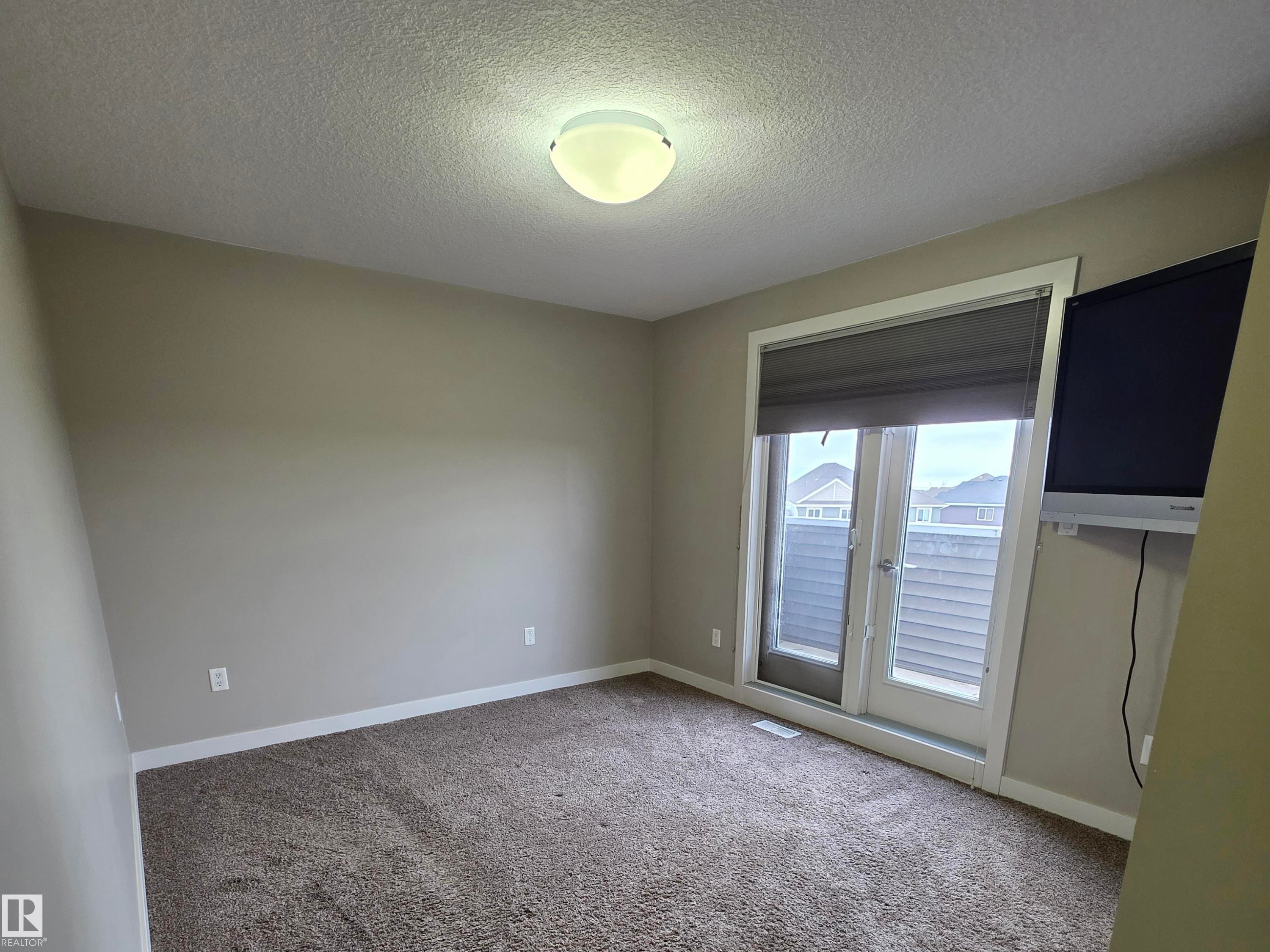2 1480 Watt Drive, Edmonton, AB - Indoor Photo Showing Bedroom