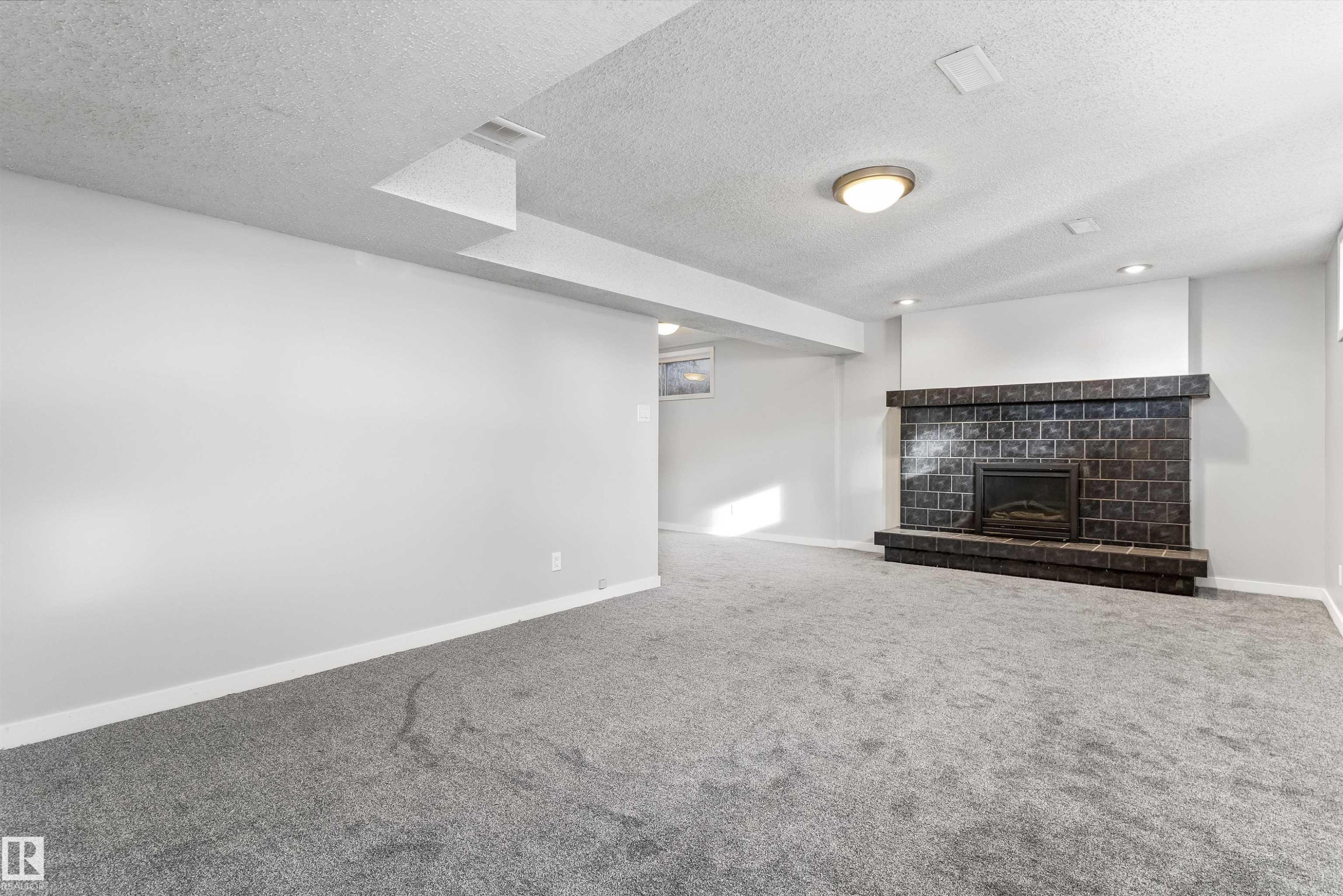 7204 10 Avenue, Edmonton, AB - Indoor Photo Showing Living Room With Fireplace