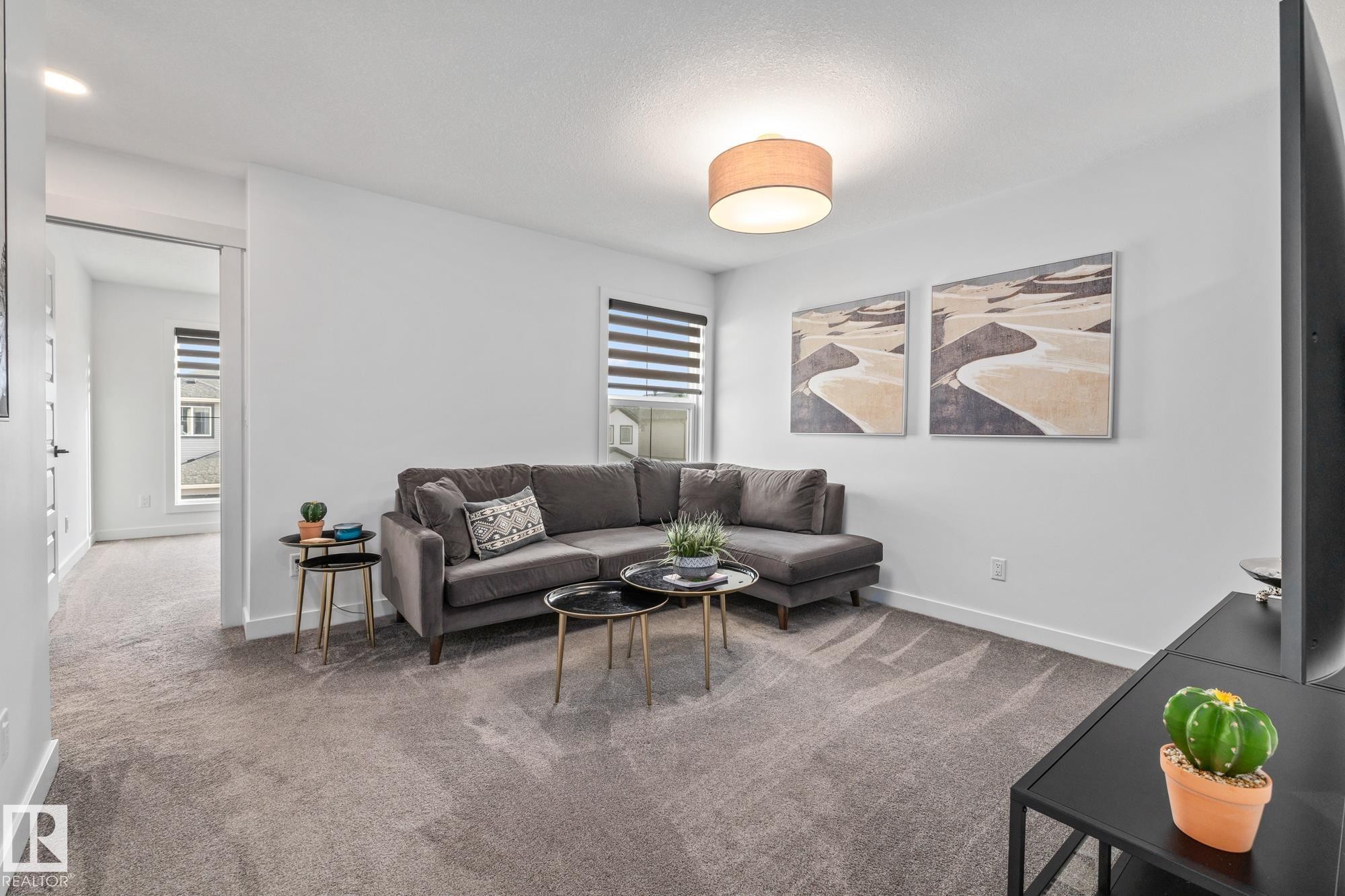 664 Astoria Way, Devon, AB - Indoor Photo Showing Living Room