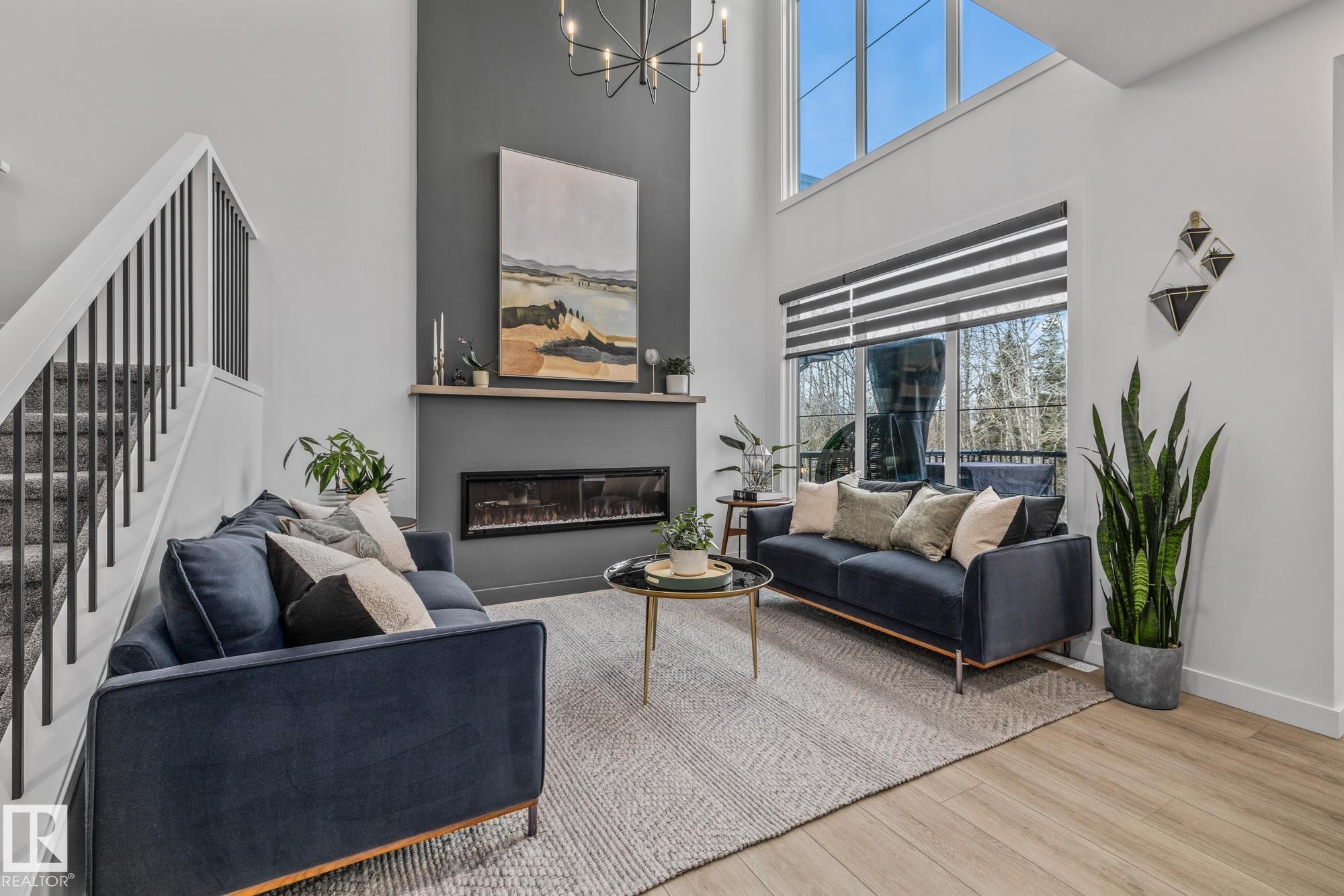 664 Astoria Way, Devon, AB - Indoor Photo Showing Living Room With Fireplace