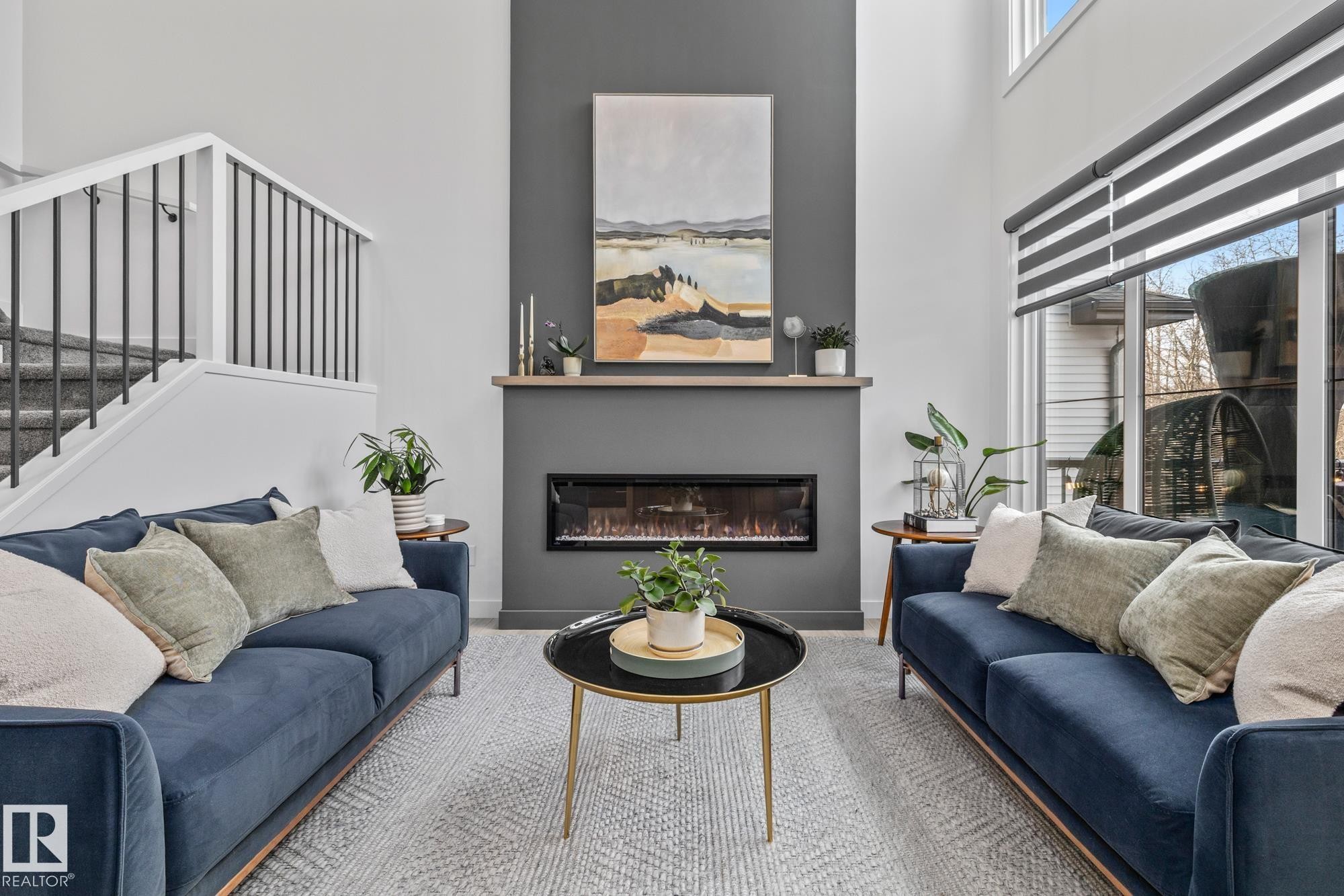 664 Astoria Way, Devon, AB - Indoor Photo Showing Living Room With Fireplace