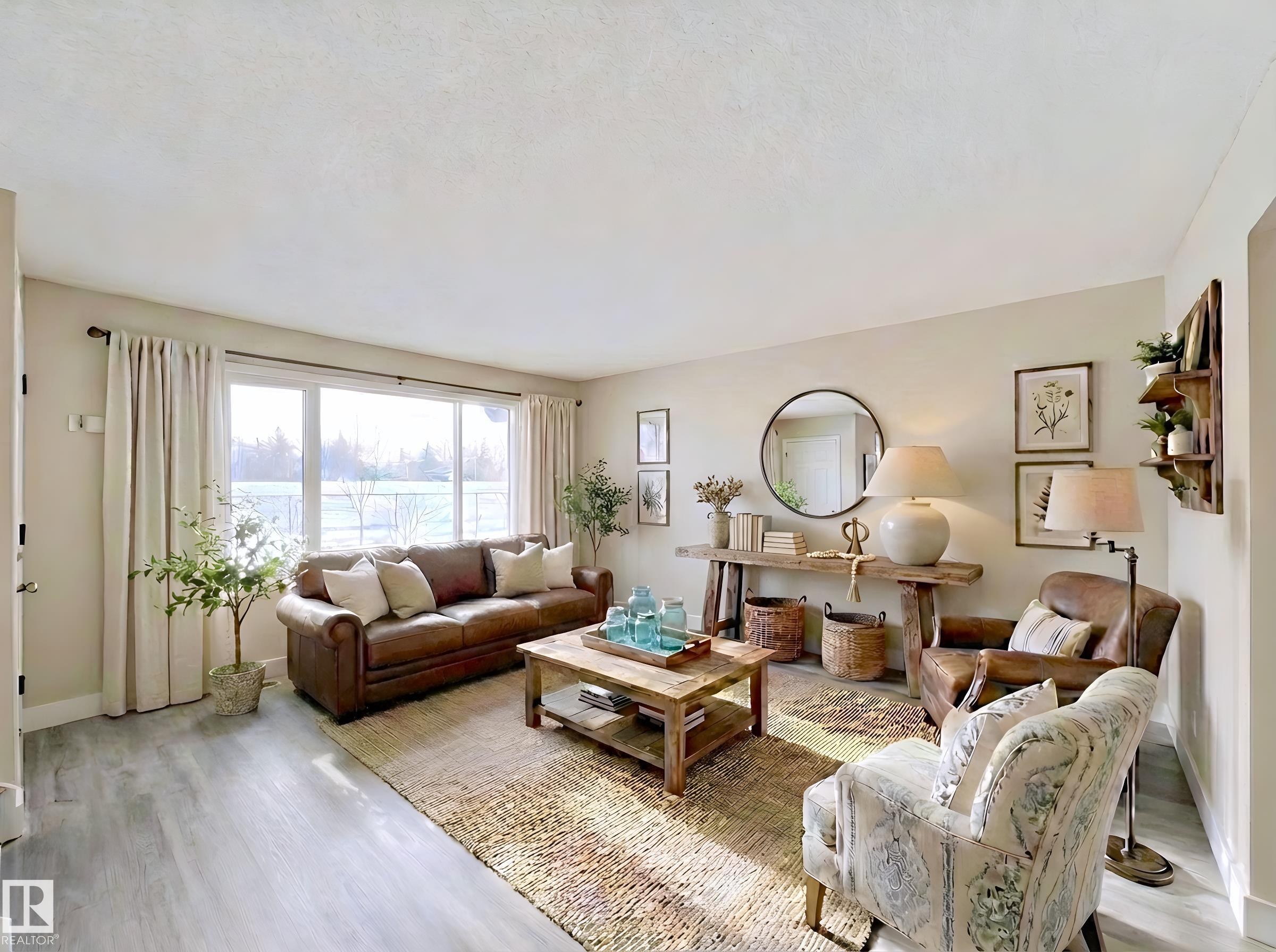 Living area with light wood finished floors - 11357 22 Avenue, Edmonton, AB - Indoor Photo Showing Living Room