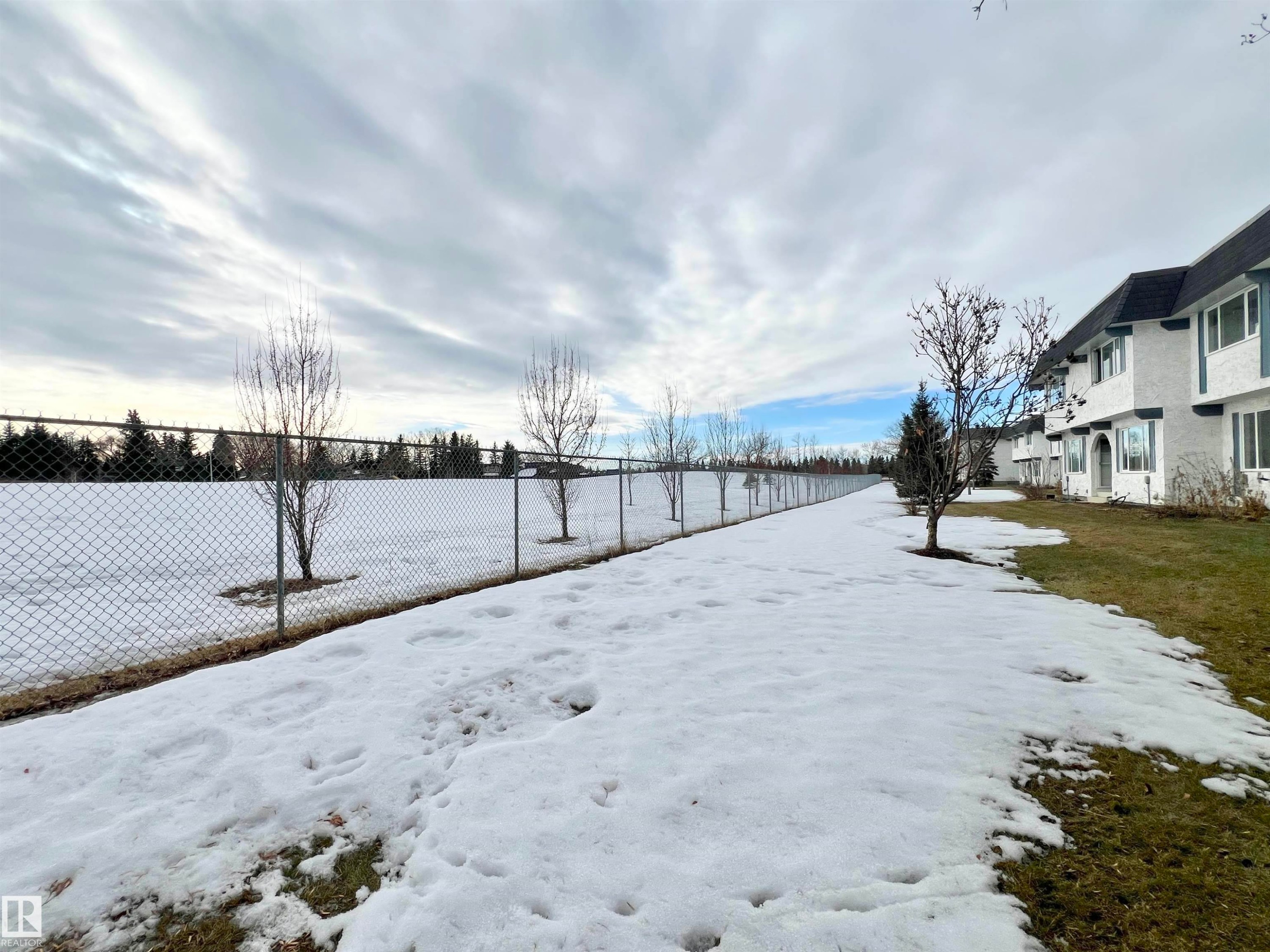 View of yard layered in snow - 11357 22 Avenue, Edmonton, AB - Outdoor