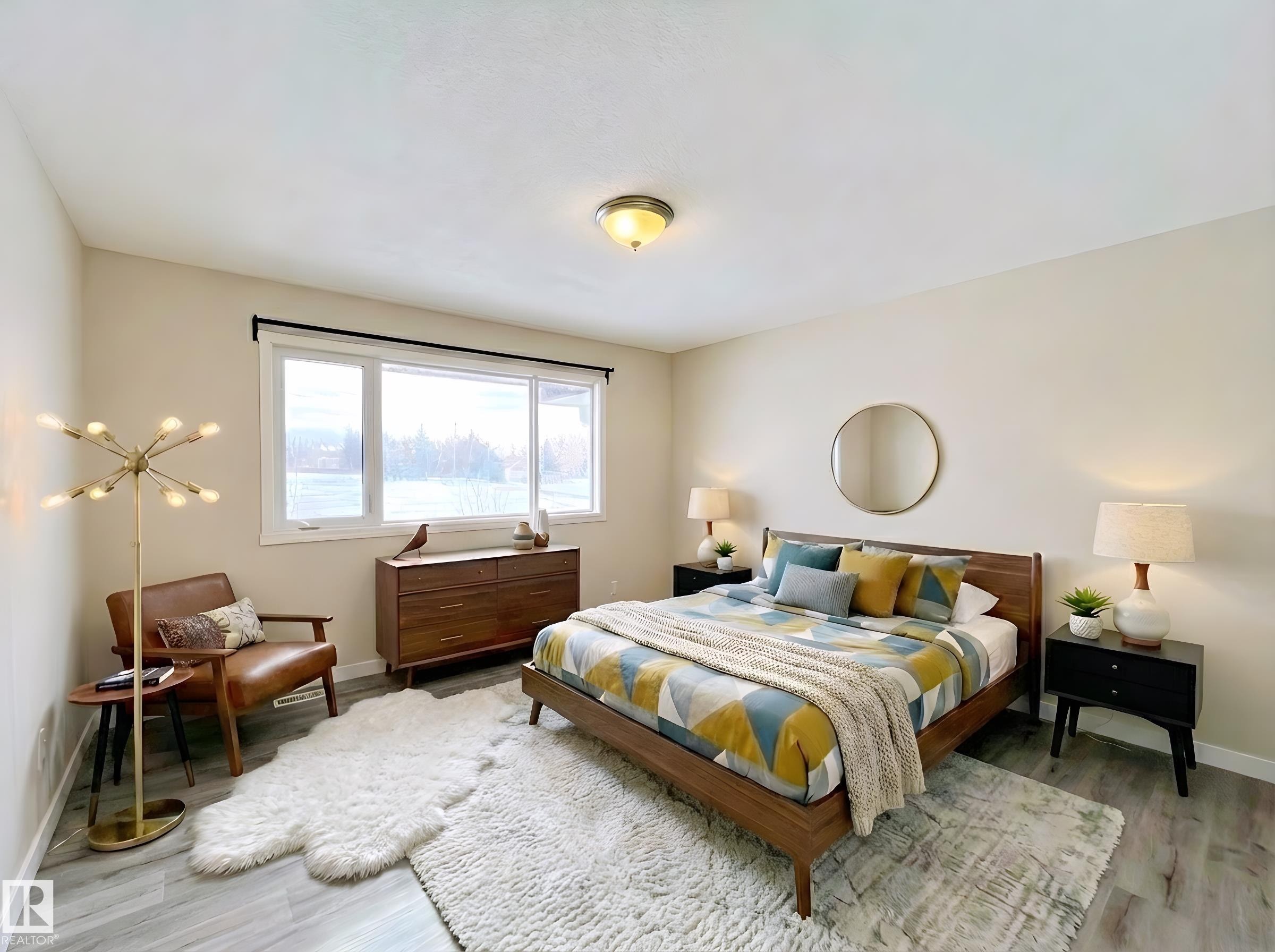 Bedroom featuring baseboards and light wood-style flooring - 11357 22 Avenue, Edmonton, AB - Indoor Photo Showing Bedroom
