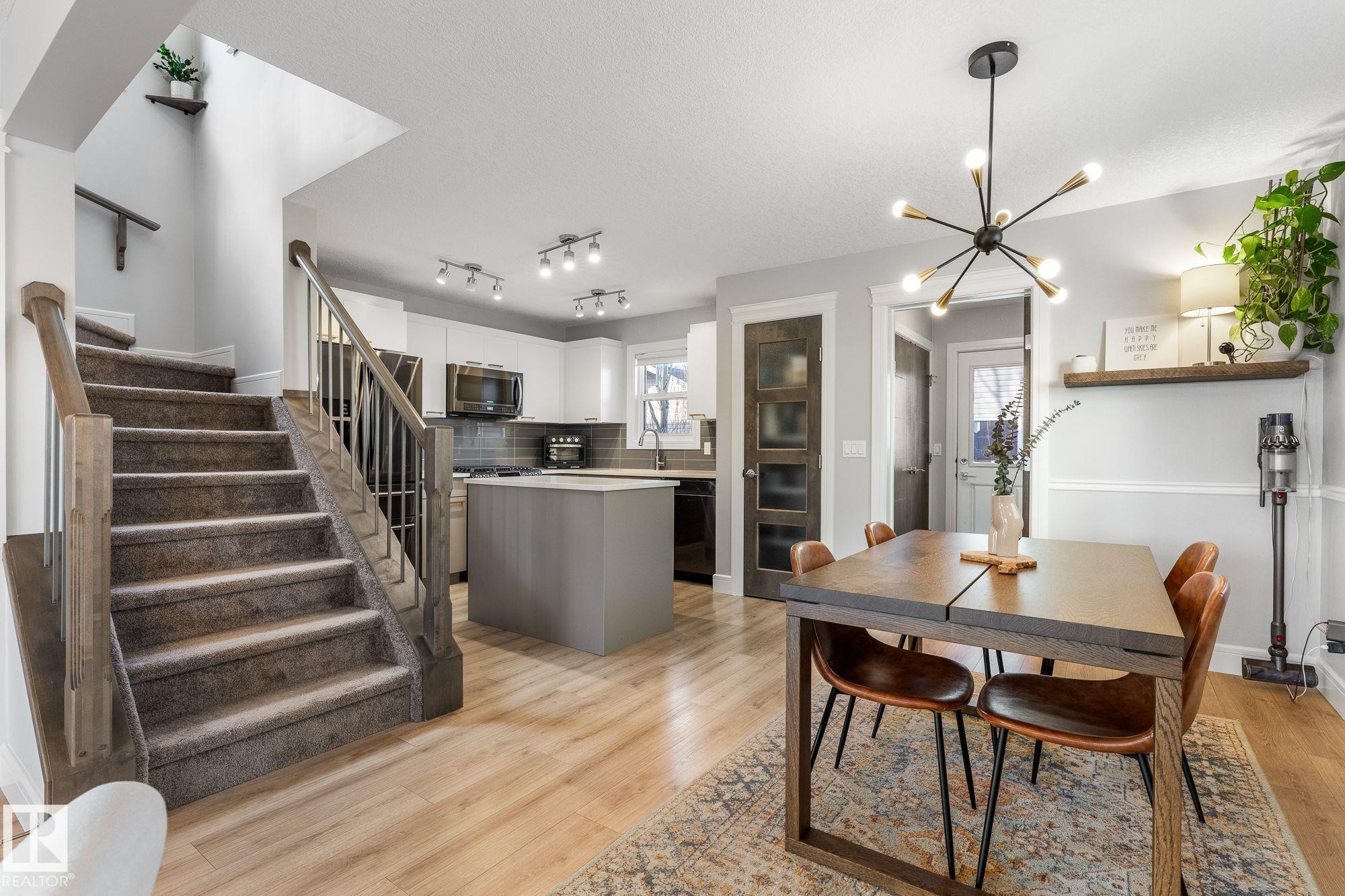 View of dining room and kitchen - 89 Hewitt Circle, Spruce Grove, AB - Indoor Photo Showing Dining Room