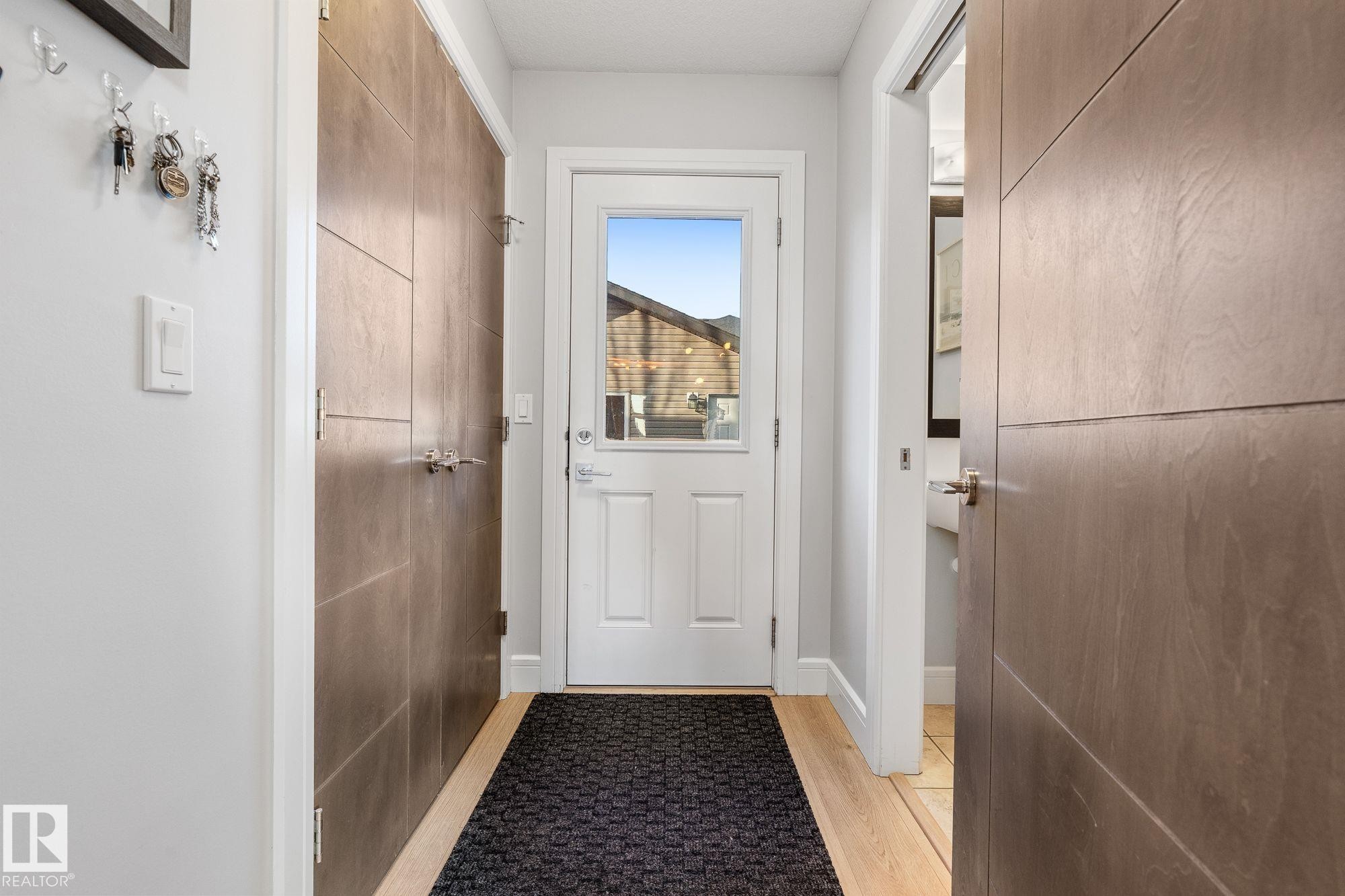 Back entry, near the main floor powder bathroom - 89 Hewitt Circle, Spruce Grove, AB - Indoor Photo Showing Other Room