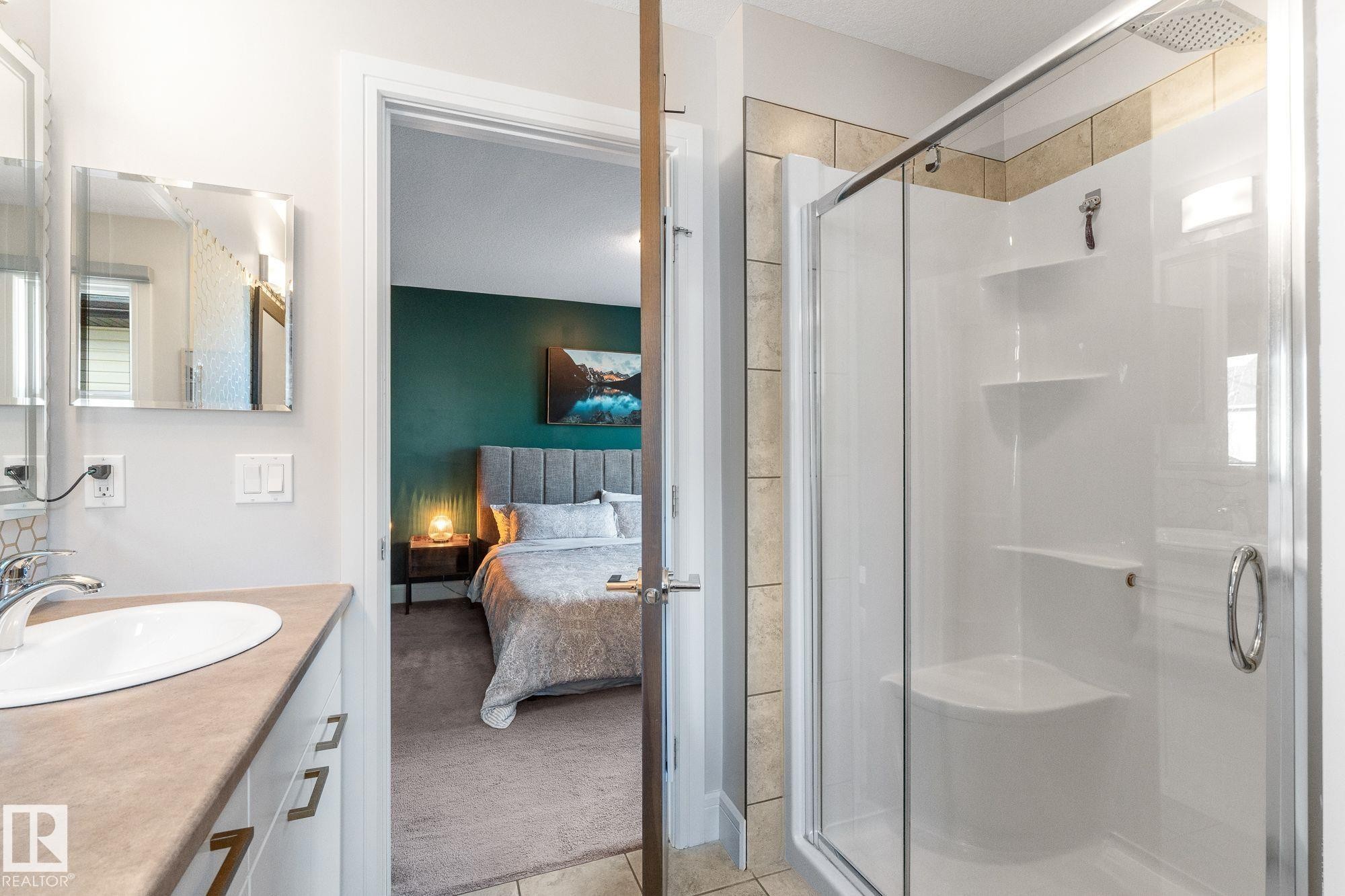 Featuring dual sink vanity and walk in shower - 89 Hewitt Circle, Spruce Grove, AB - Indoor Photo Showing Bathroom