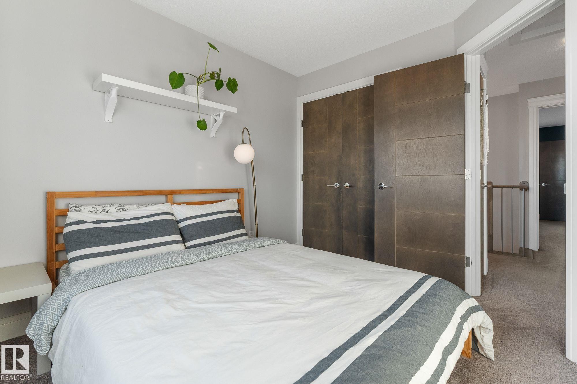 Bedroom featuring carpet floors and a closet - 89 Hewitt Circle, Spruce Grove, AB - Indoor Photo Showing Bedroom