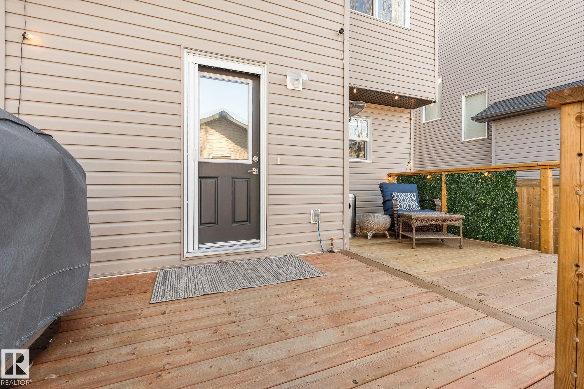 Wooden deck featuring natural gas bbq hook up - 89 Hewitt Circle, Spruce Grove, AB - Outdoor With Deck Patio Veranda With Exterior