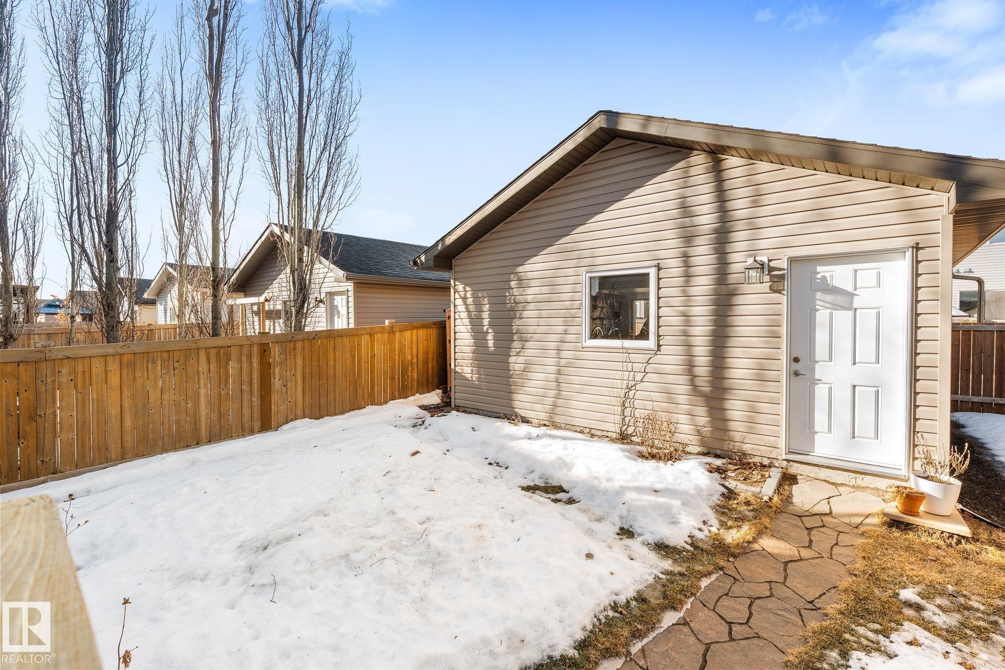 Featuring fenced and landscaped backyard - 89 Hewitt Circle, Spruce Grove, AB - Outdoor