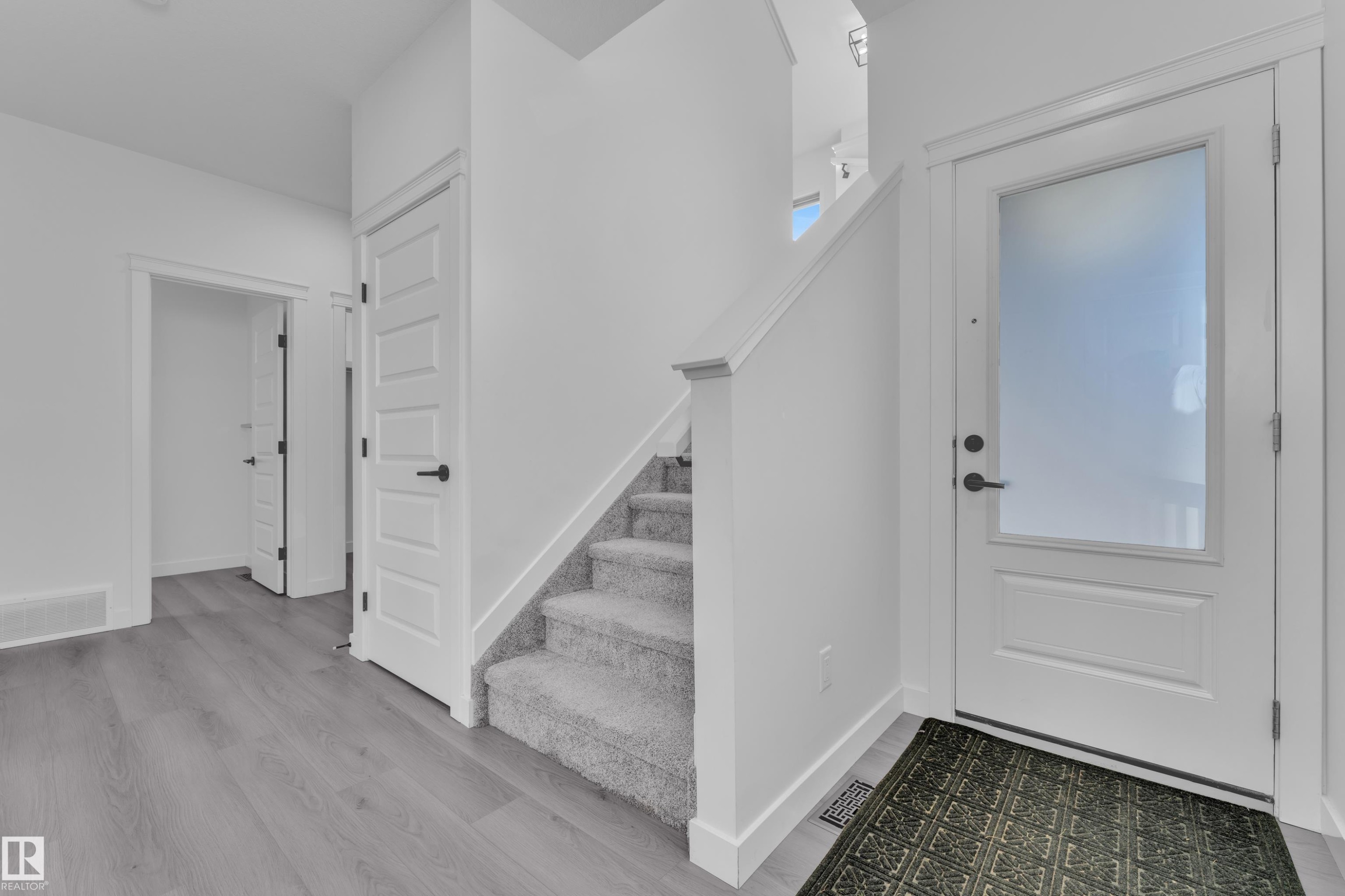 Entryway with stairway and light wood-style floors - 1822 Collip View, Edmonton, AB