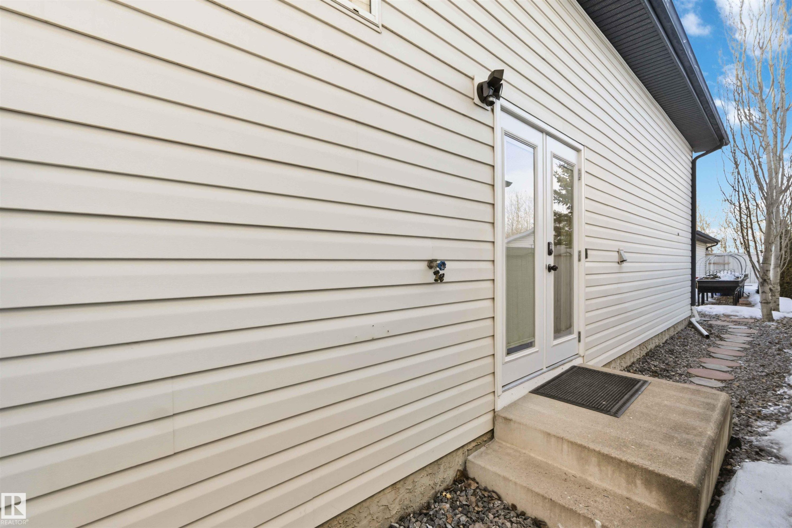 Side Entrance to property - 1706 Turvey Bend, Edmonton, AB - Outdoor With Exterior