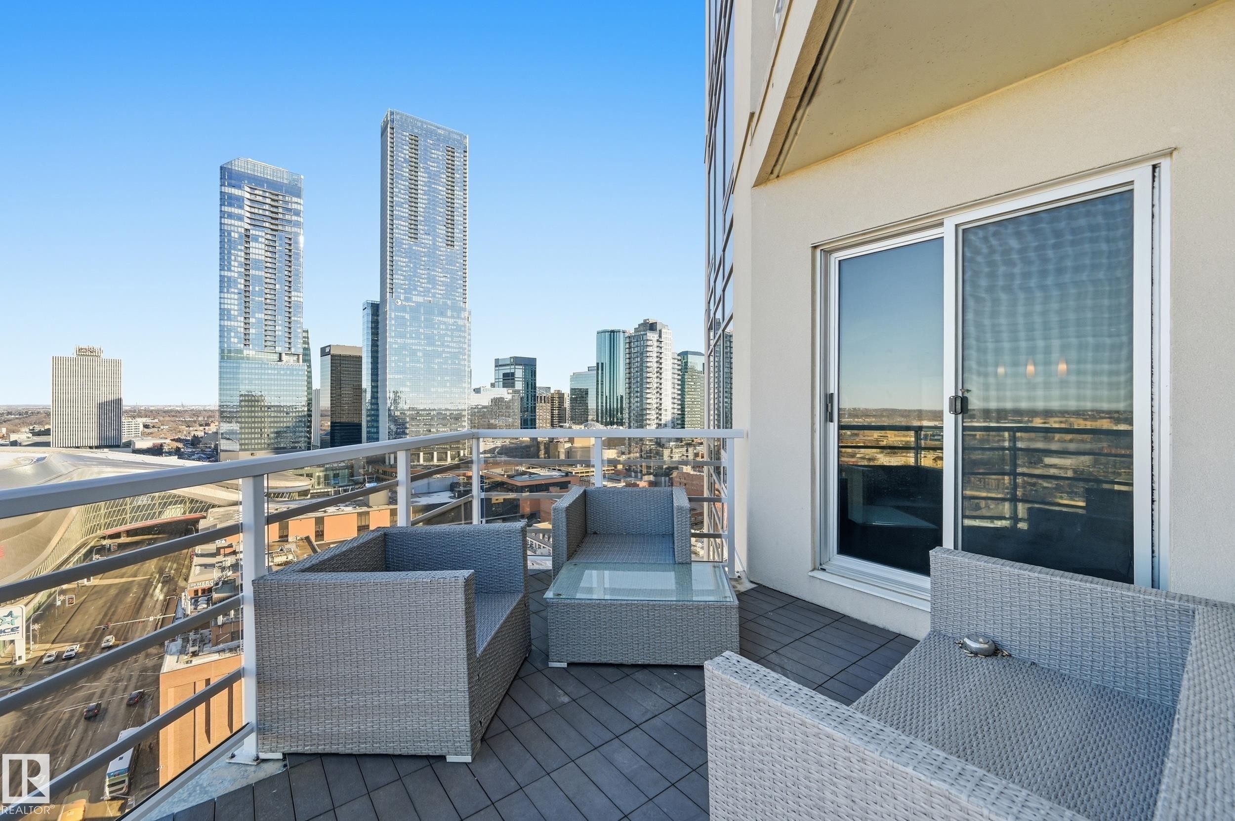 Balcony featuring outdoor seating and a skyline view - 2003 10388 105 Street, Edmonton, AB - Outdoor With Balcony