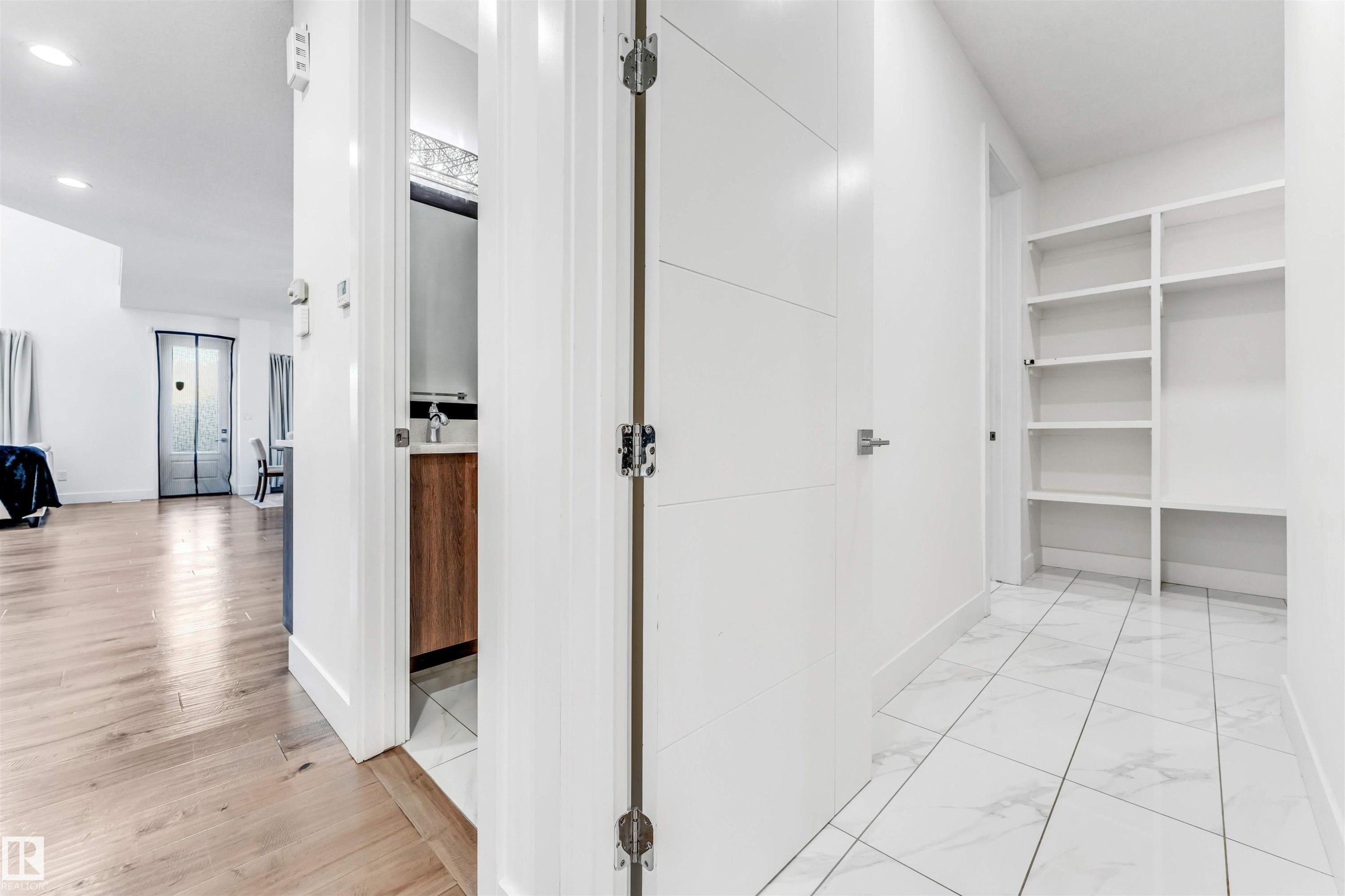 Corridor with baseboards and recessed lighting - 1407 Graydon Hill Way, Edmonton, AB - Indoor Photo Showing Other Room
