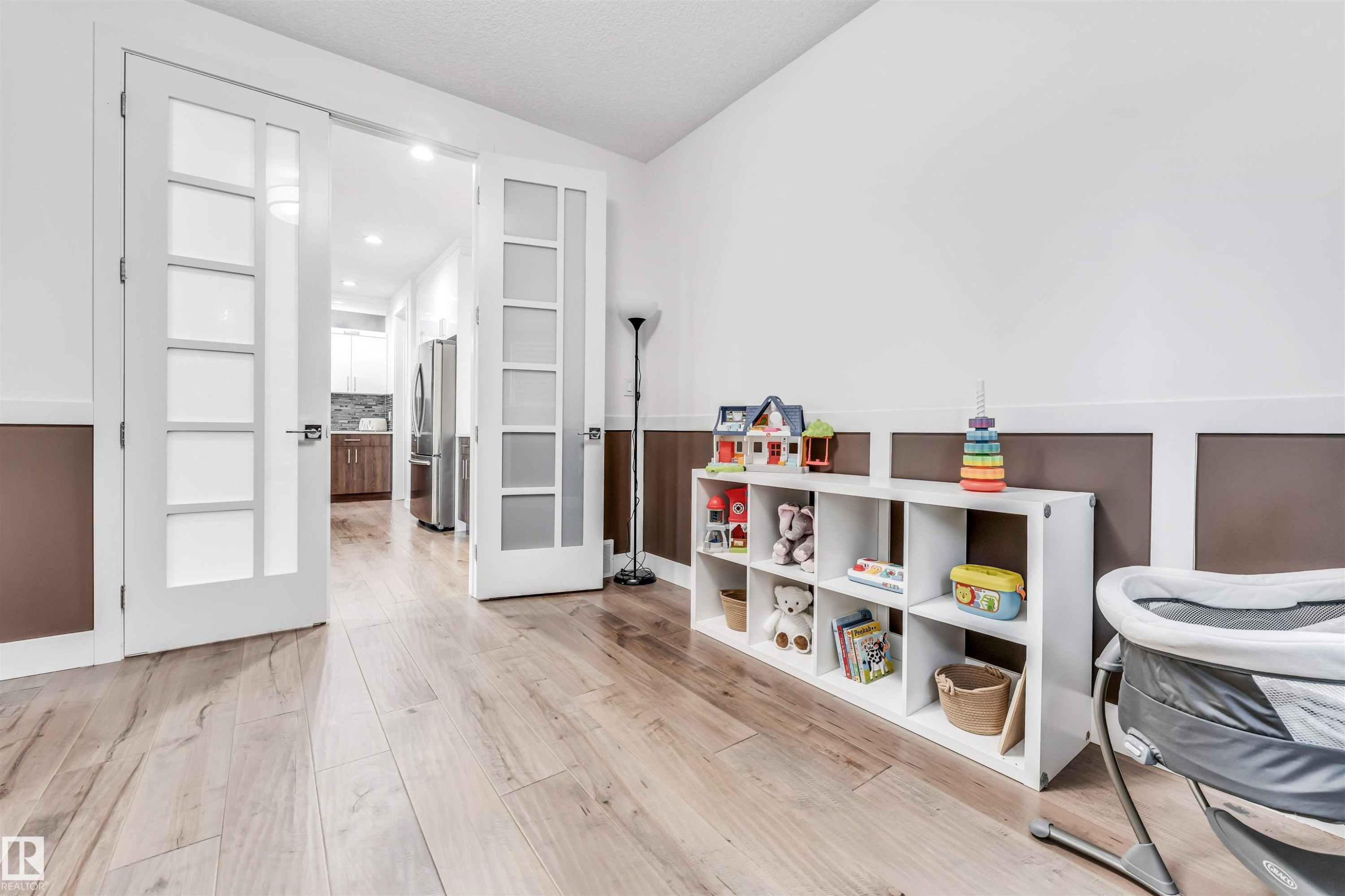 Game room featuring light wood finished floors and recessed lighting - 1407 Graydon Hill Way, Edmonton, AB - Indoor