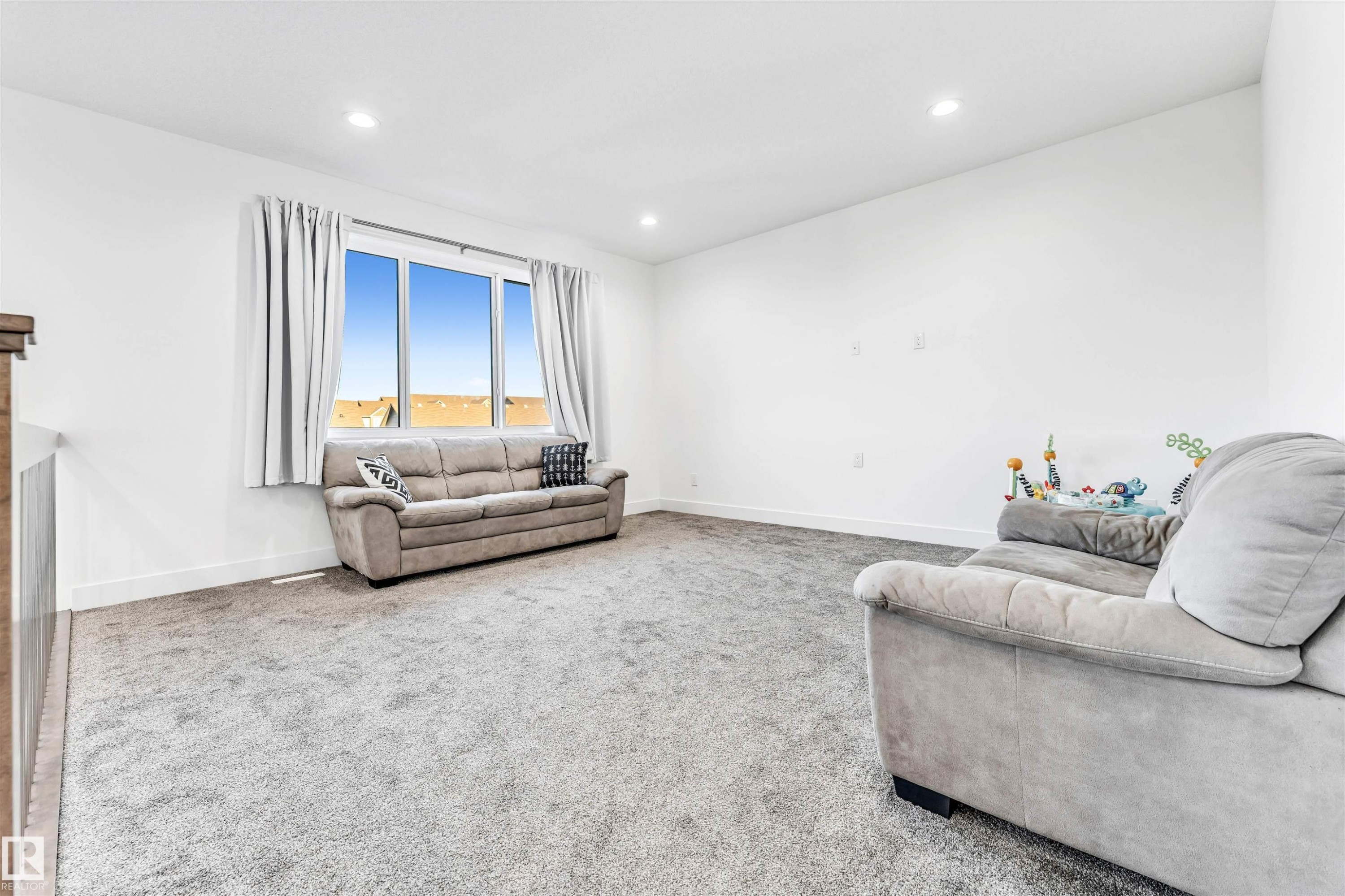 Living area with carpet floors and recessed lighting - 1407 Graydon Hill Way, Edmonton, AB - Indoor Photo Showing Other Room