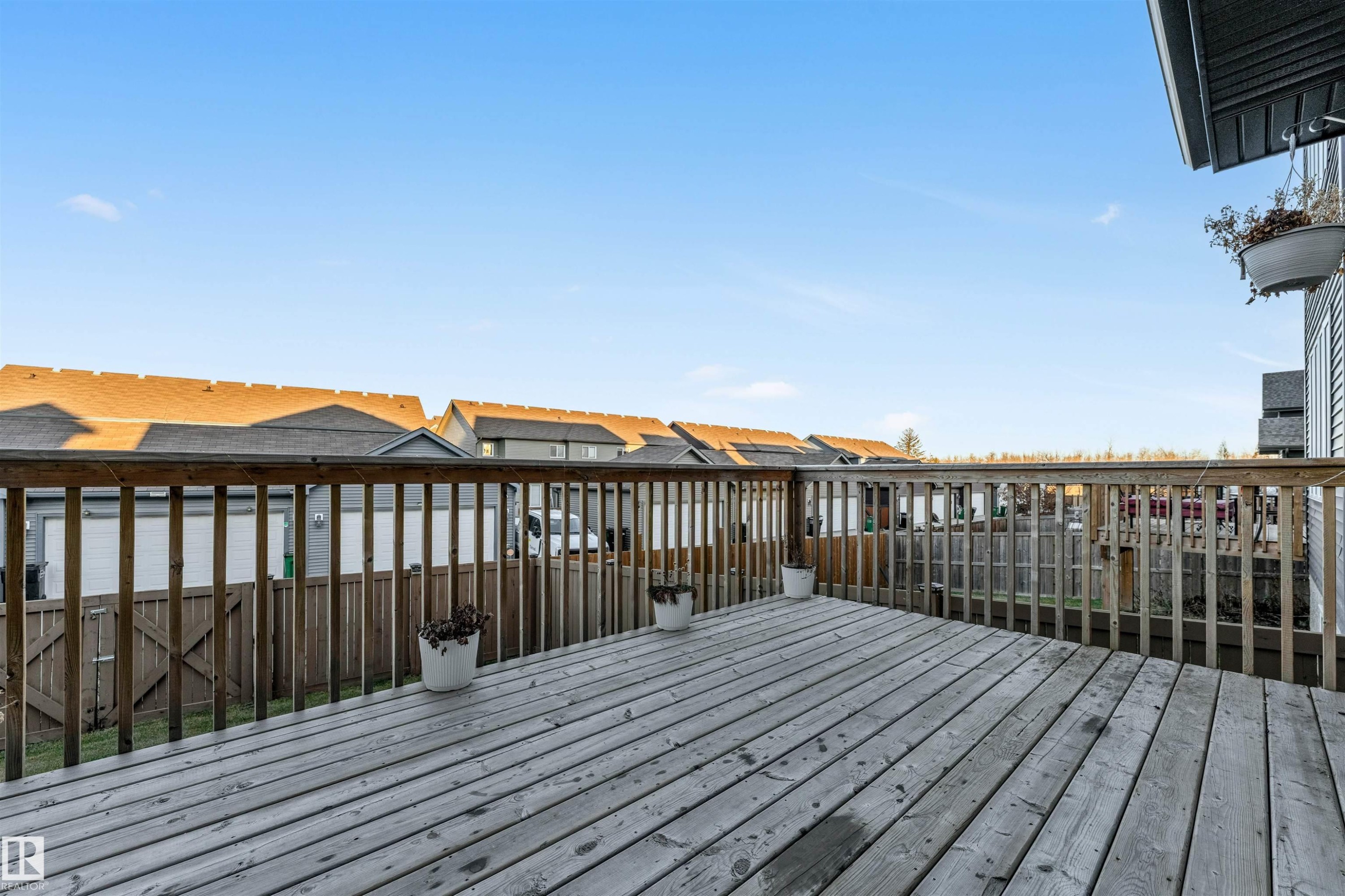 Wooden deck featuring a residential view - 1407 Graydon Hill Way, Edmonton, AB - Outdoor With Exterior