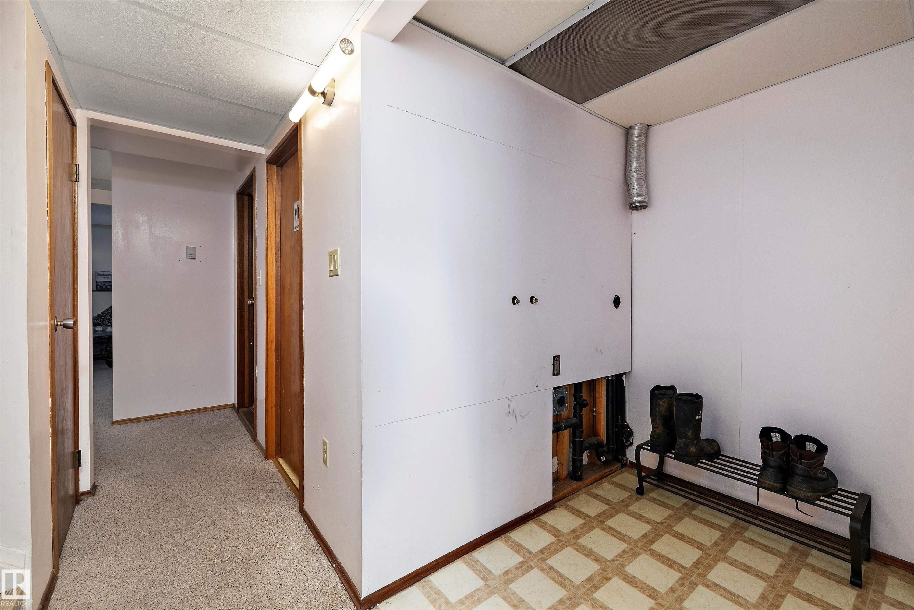Laundry area featuring baseboards - 12117 91 Street, Edmonton, AB - Indoor Photo Showing Other Room