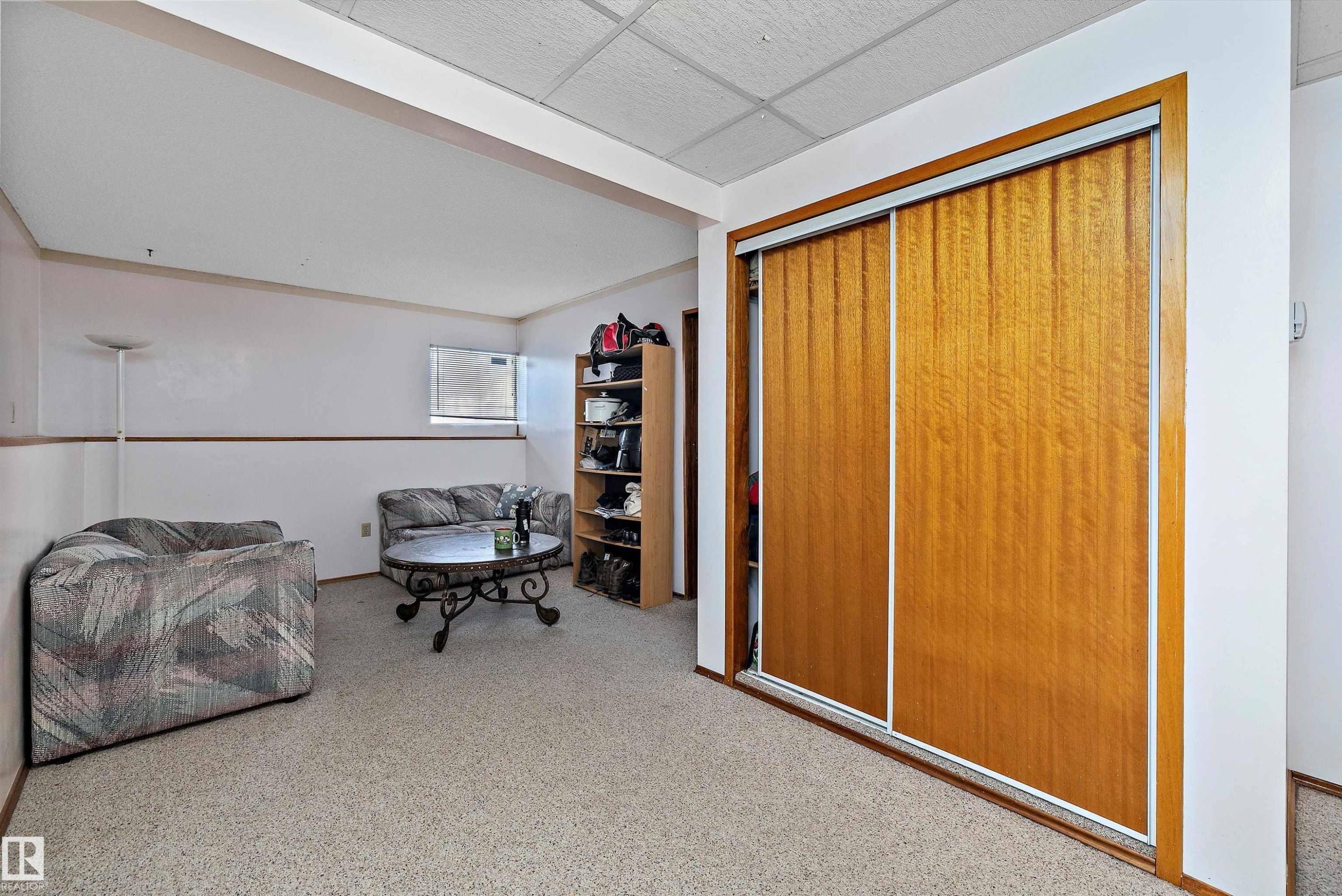 Sitting room featuring carpet and a paneled ceiling - 12117 91 Street, Edmonton, AB - Indoor