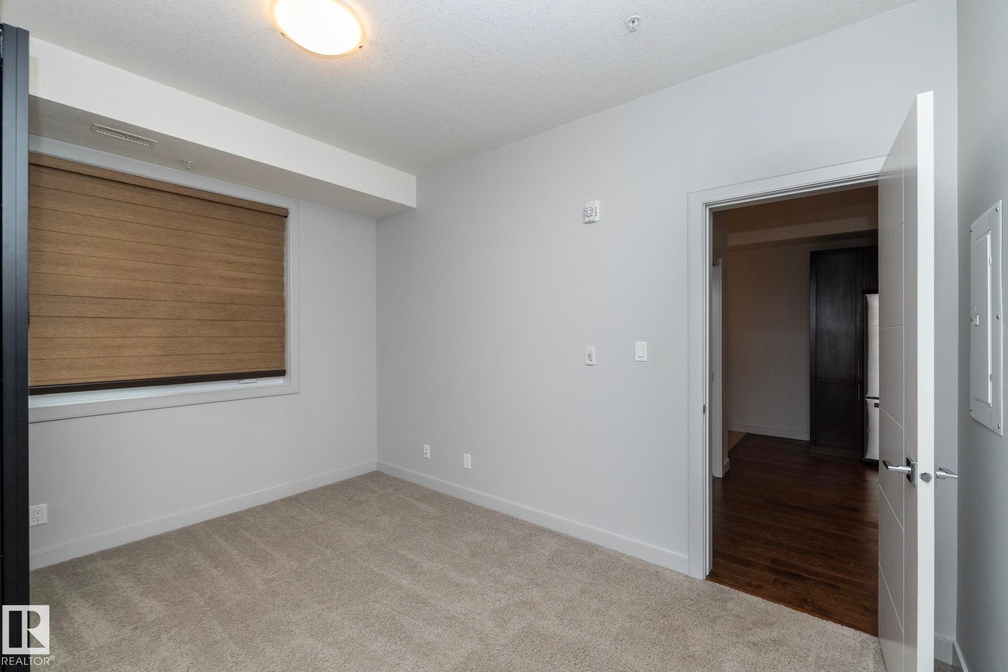 213 10811 72 Avenue, Edmonton, AB - Indoor Photo Showing Other Room