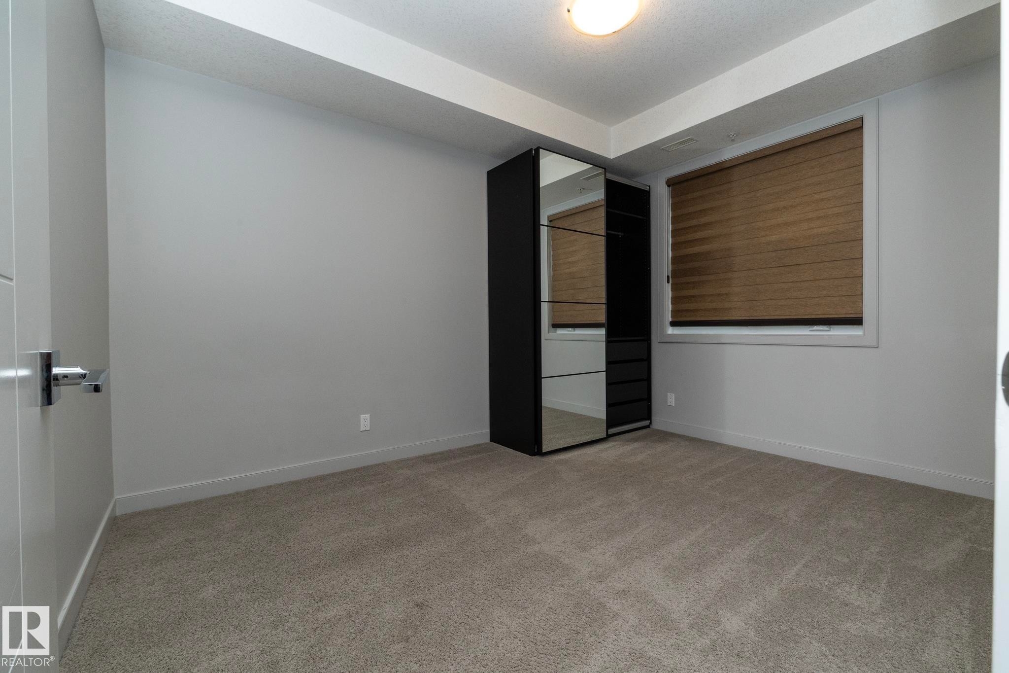 213 10811 72 Avenue, Edmonton, AB - Indoor Photo Showing Other Room