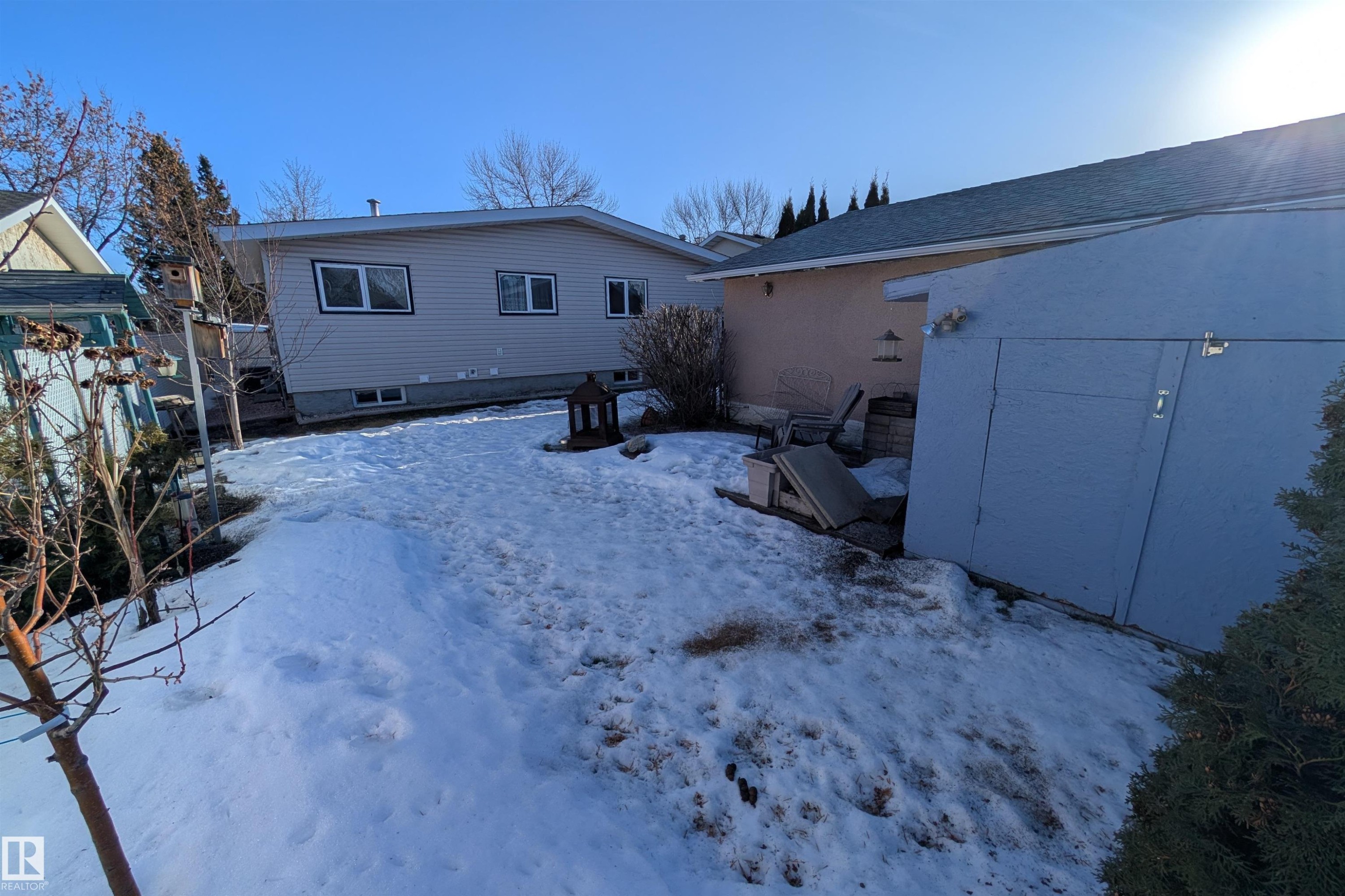 View of snow covered house - 7 Mohawk Crescent, Leduc, AB - Outdoor With Exterior