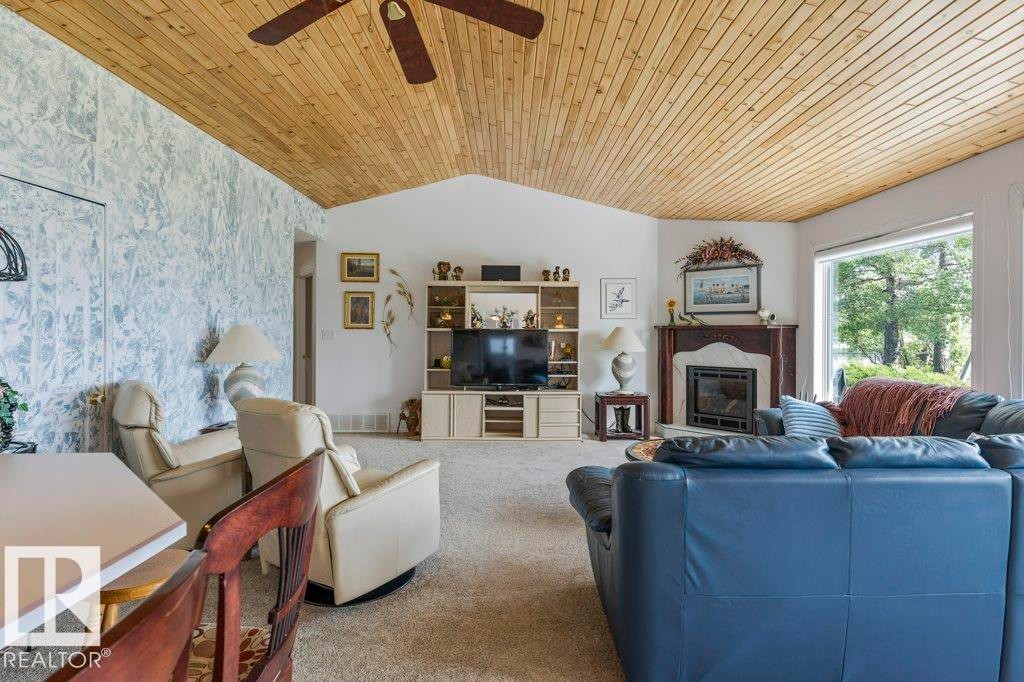 3013A Twp Rd 574, Rural Barrhead County, AB - Indoor Photo Showing Living Room With Fireplace