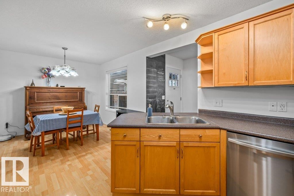 69 Erie Street, Devon, AB - Indoor Photo Showing Kitchen With Double Sink