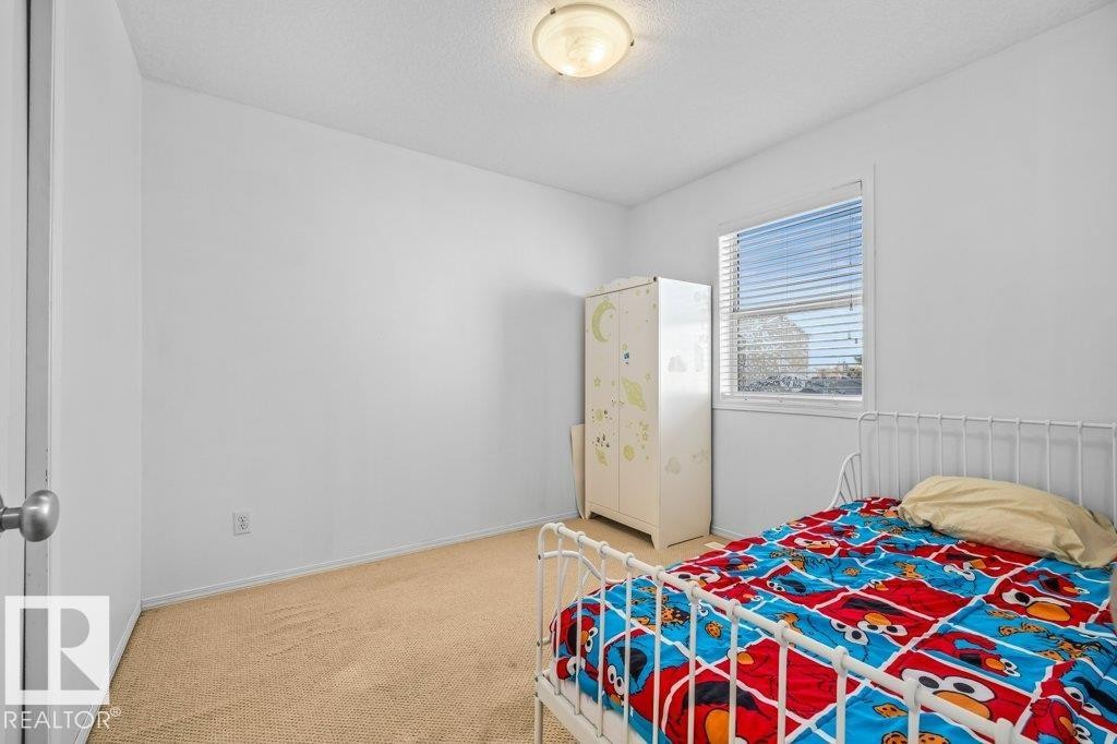 69 Erie Street, Devon, AB - Indoor Photo Showing Bedroom