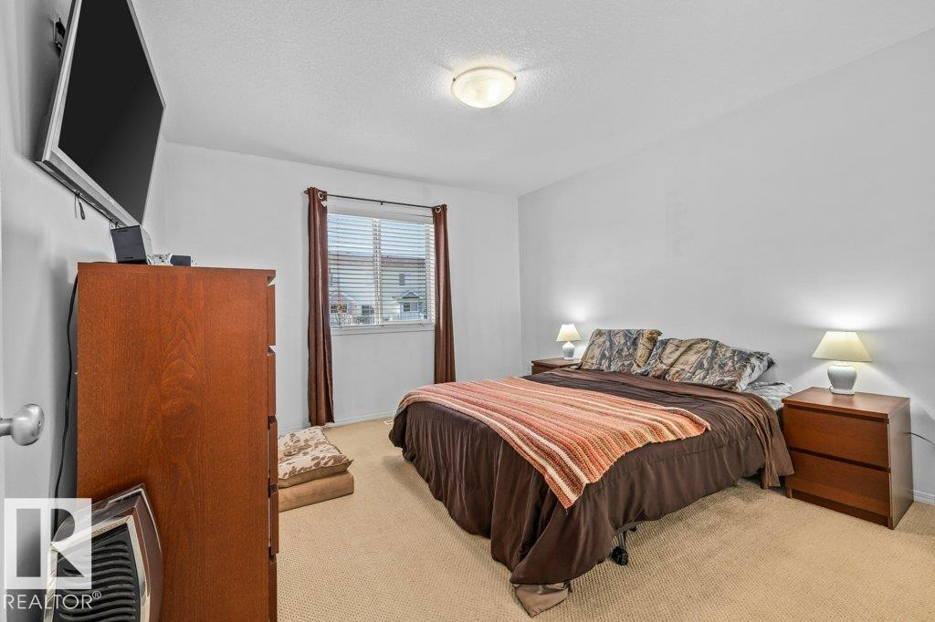 69 Erie Street, Devon, AB - Indoor Photo Showing Bedroom
