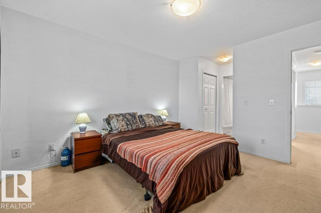 69 Erie Street, Devon, AB - Indoor Photo Showing Bedroom