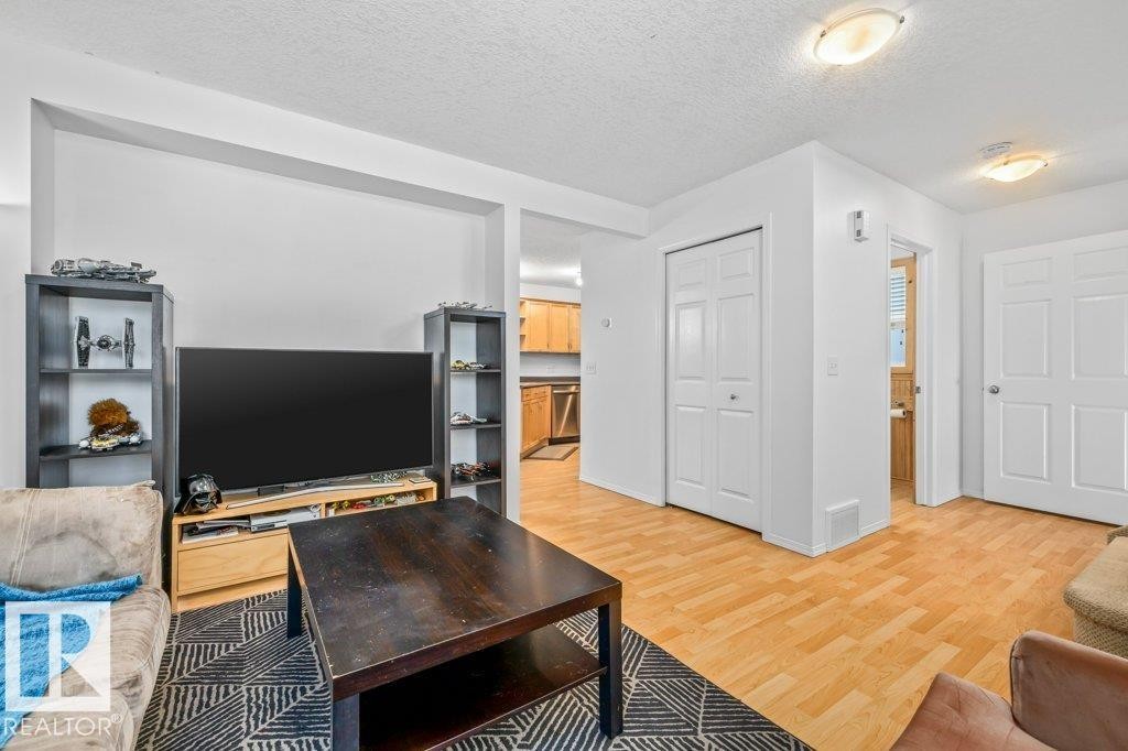 69 Erie Street, Devon, AB - Indoor Photo Showing Living Room