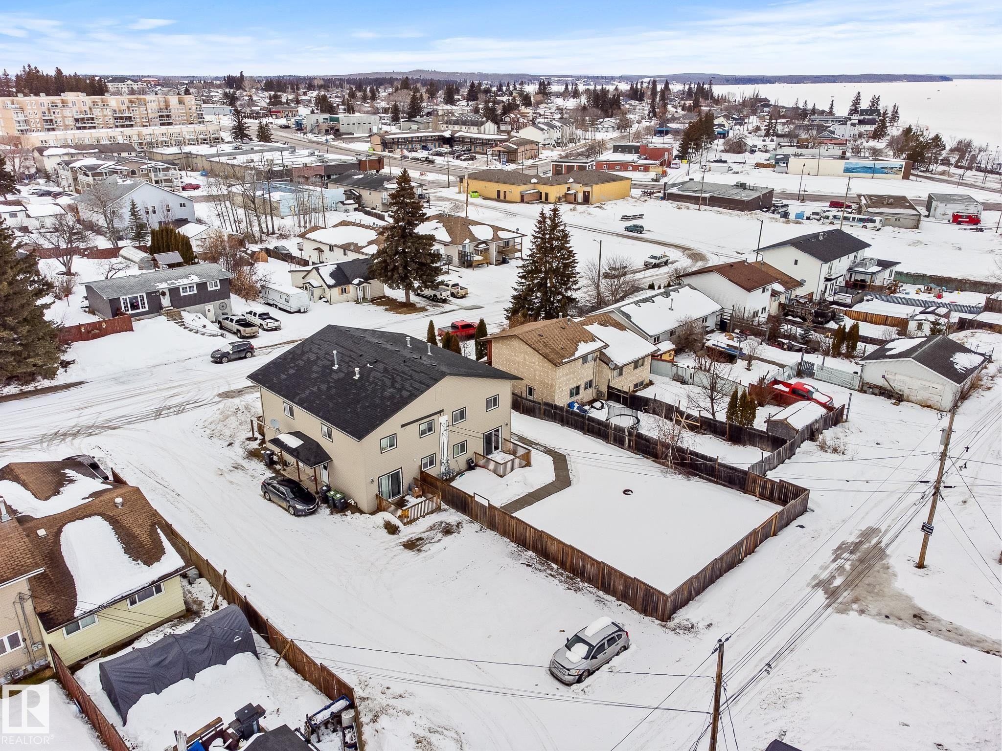 Snowy aerial view with a residential view - 914 9 Street, Cold Lake, AB - Outdoor With View