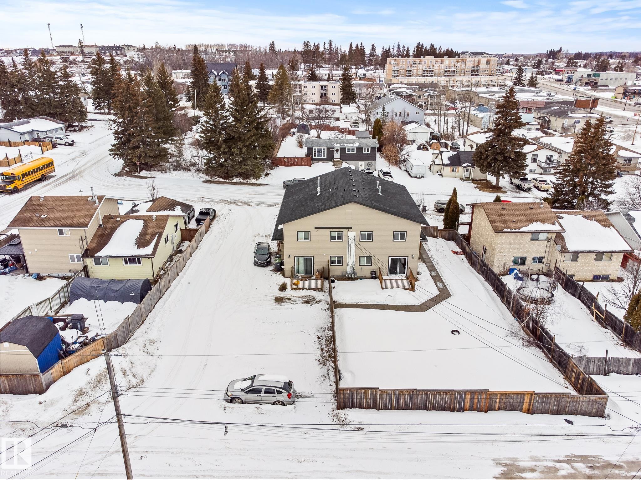 Snowy aerial view with a residential view - 914 9 Street, Cold Lake, AB - Outdoor With View