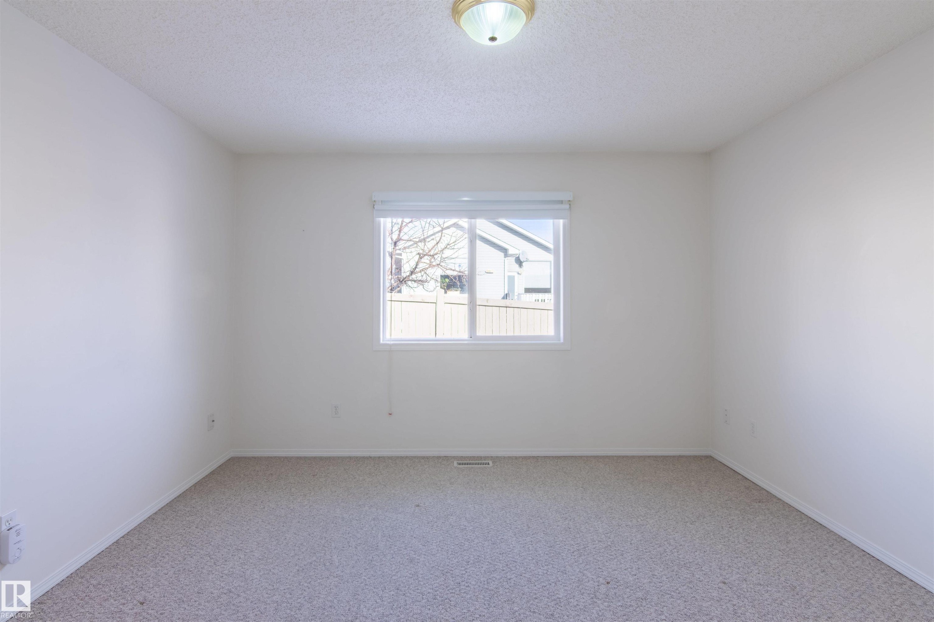 41 14428 Miller Boulevard, Edmonton, AB - Indoor Photo Showing Other Room