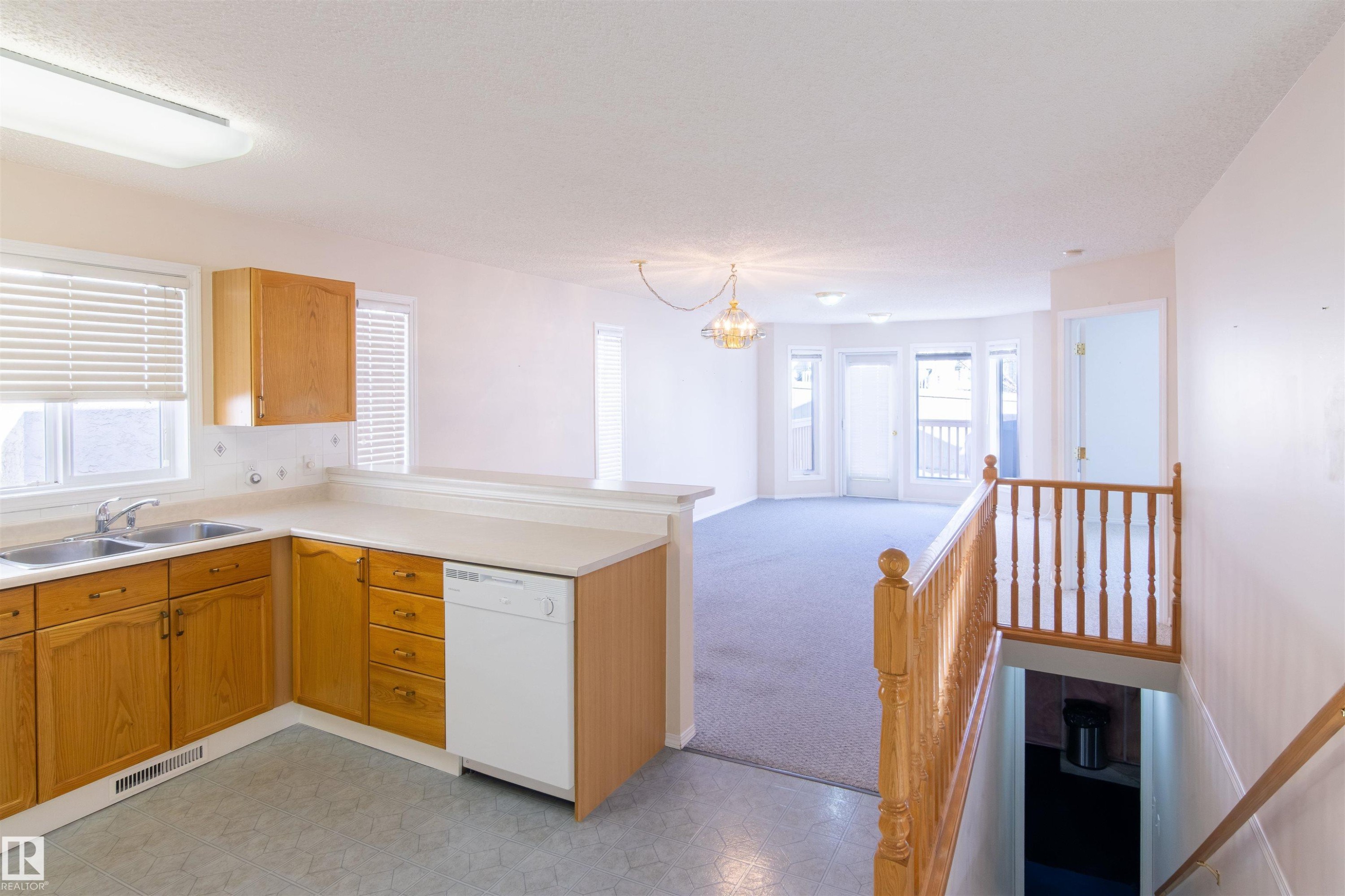 41 14428 Miller Boulevard, Edmonton, AB - Indoor Photo Showing Kitchen With Double Sink