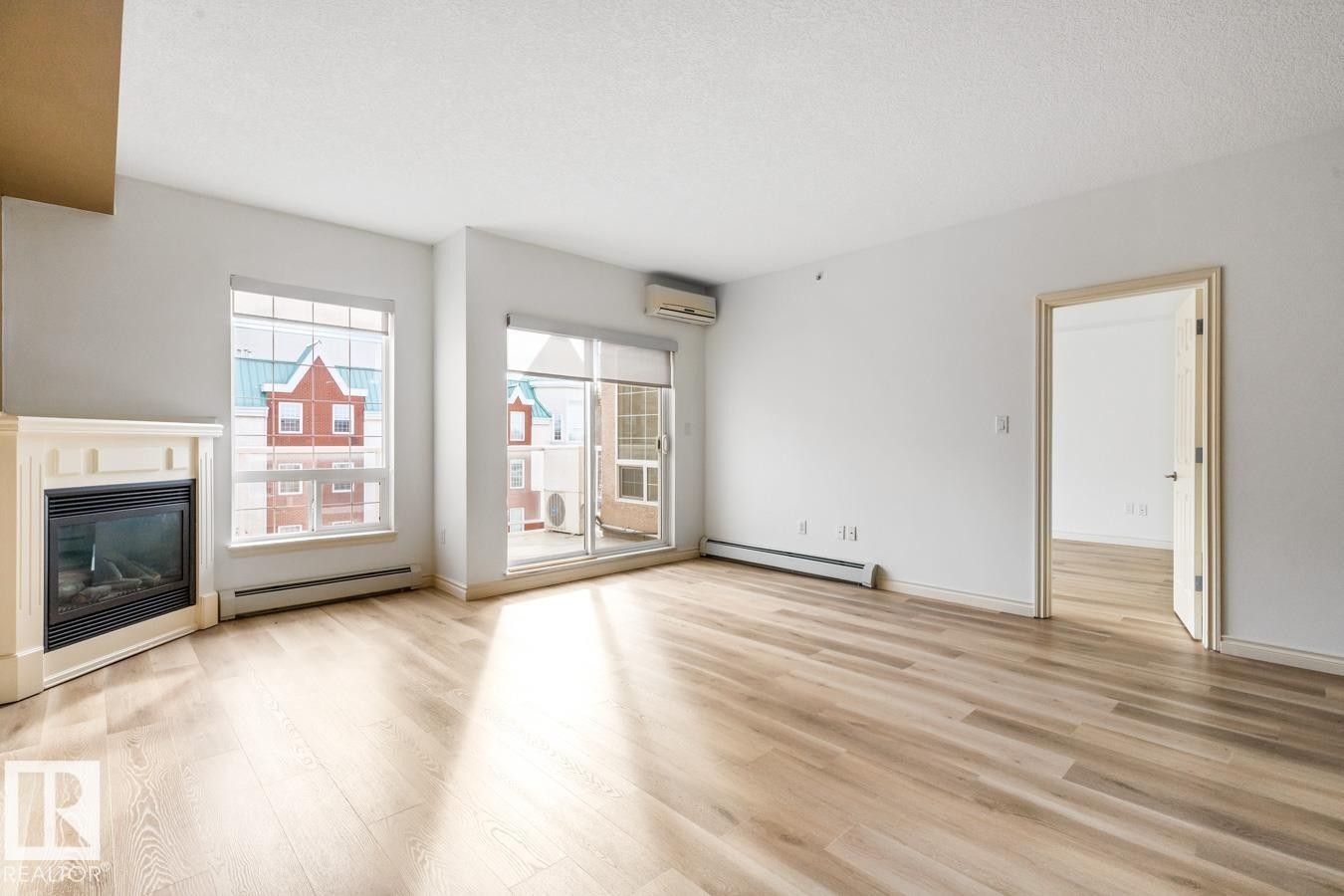 407 5 Perron Street, St. Albert, AB - Indoor Photo Showing Living Room With Fireplace