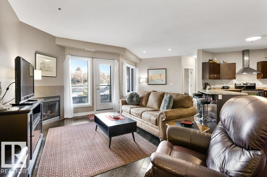 219 35 Sturgeon Road, St. Albert, AB - Indoor Photo Showing Living Room With Fireplace