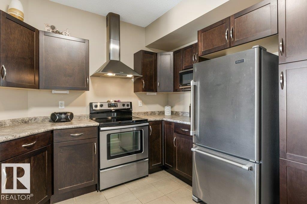 219 35 Sturgeon Road, St. Albert, AB - Indoor Photo Showing Kitchen With Stainless Steel Kitchen