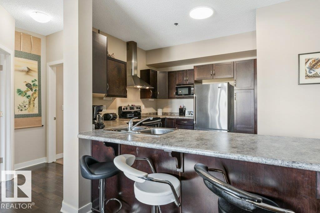 219 35 Sturgeon Road, St. Albert, AB - Indoor Photo Showing Kitchen With Stainless Steel Kitchen With Double Sink