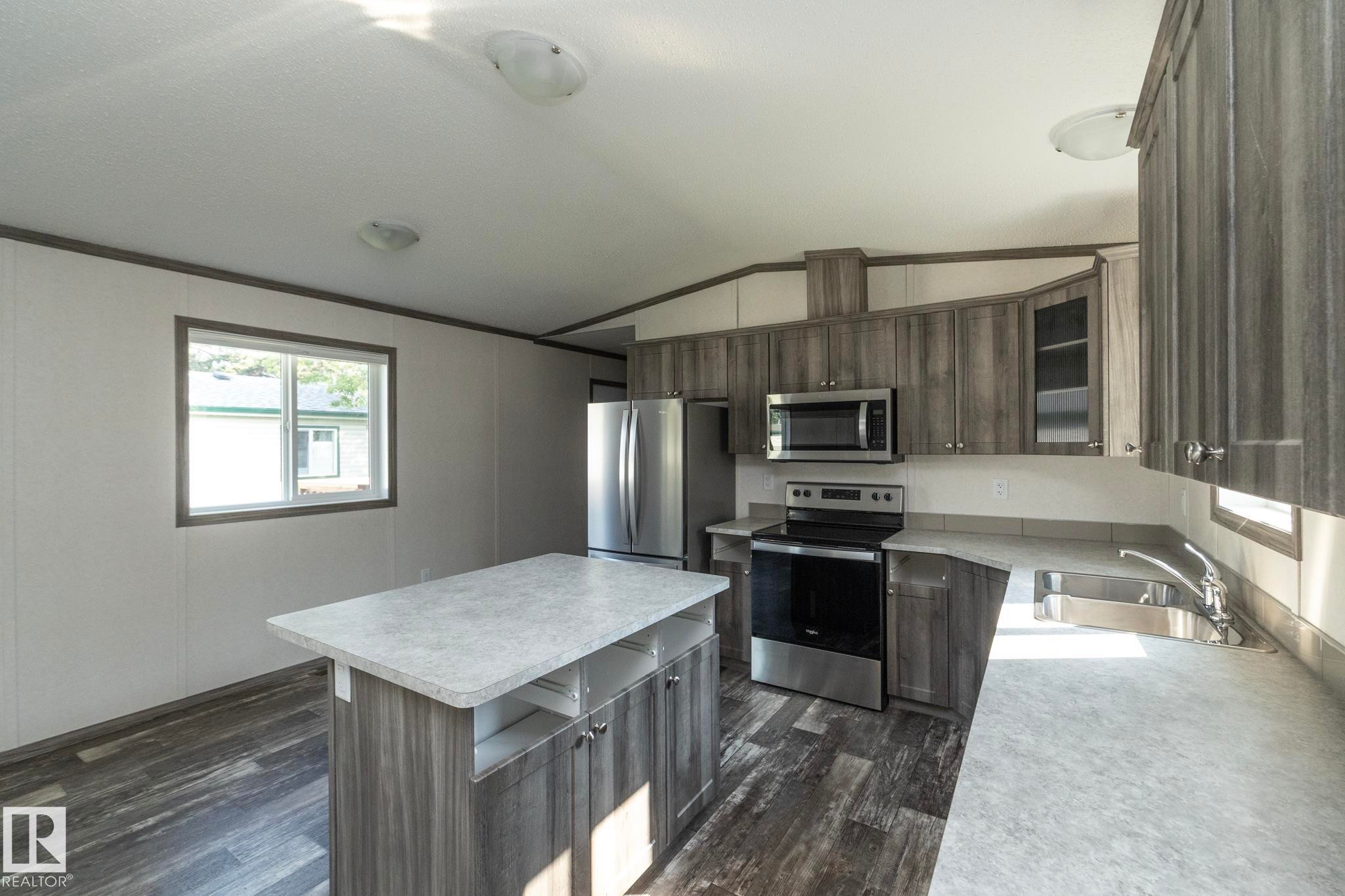 74 Willow Park Estates, Leduc, AB - Indoor Photo Showing Kitchen With Double Sink