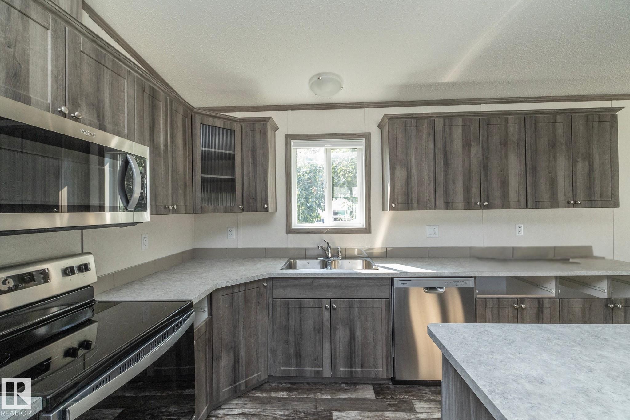 74 Willow Park Estates, Leduc, AB - Indoor Photo Showing Kitchen With Double Sink