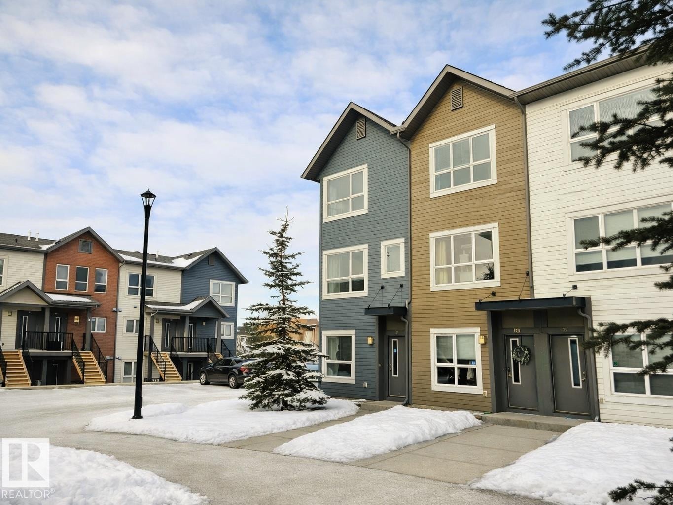 View of front of property featuring a residential view - 129 2560 Pegasus Boulevard, Edmonton, AB - Outdoor With Facade