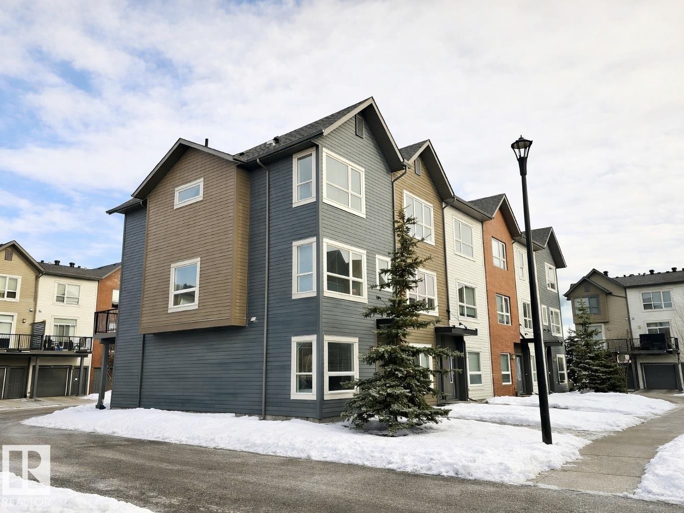 View of snowy exterior - 129 2560 Pegasus Boulevard, Edmonton, AB - Outdoor