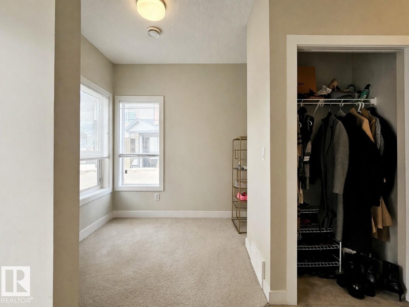 View of closet - 129 2560 Pegasus Boulevard, Edmonton, AB - Indoor Photo Showing Other Room