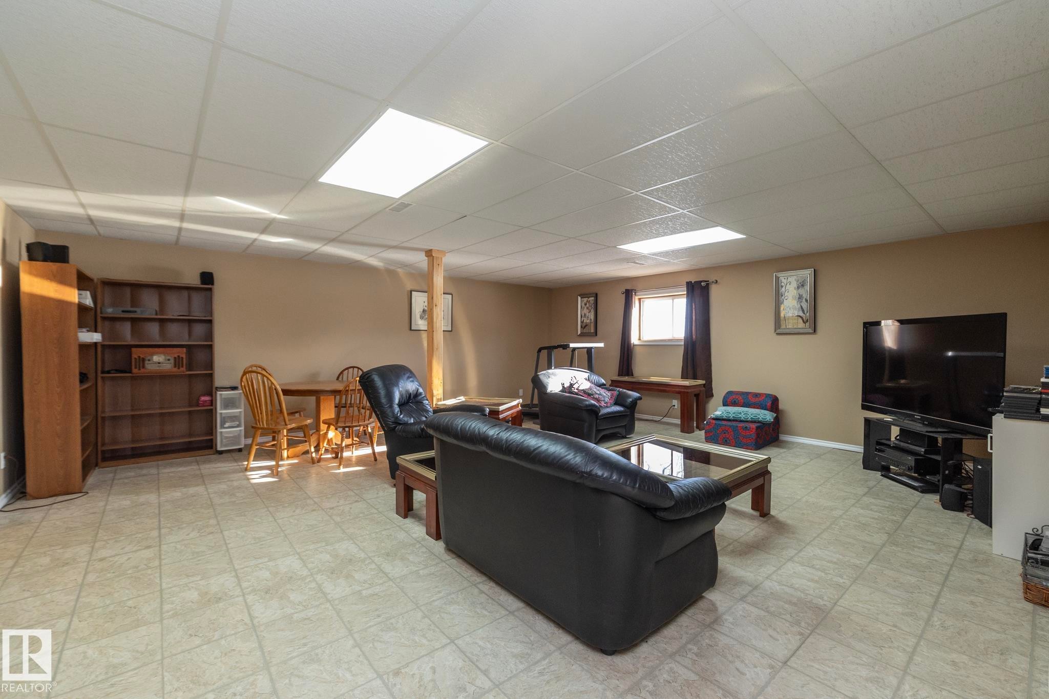 Plenty of space for other family activities in addition to T.V. / movie area. Space for ideas here too! - 57524 Range Road 270, Rural Westlock County, AB - Indoor Photo Showing Basement