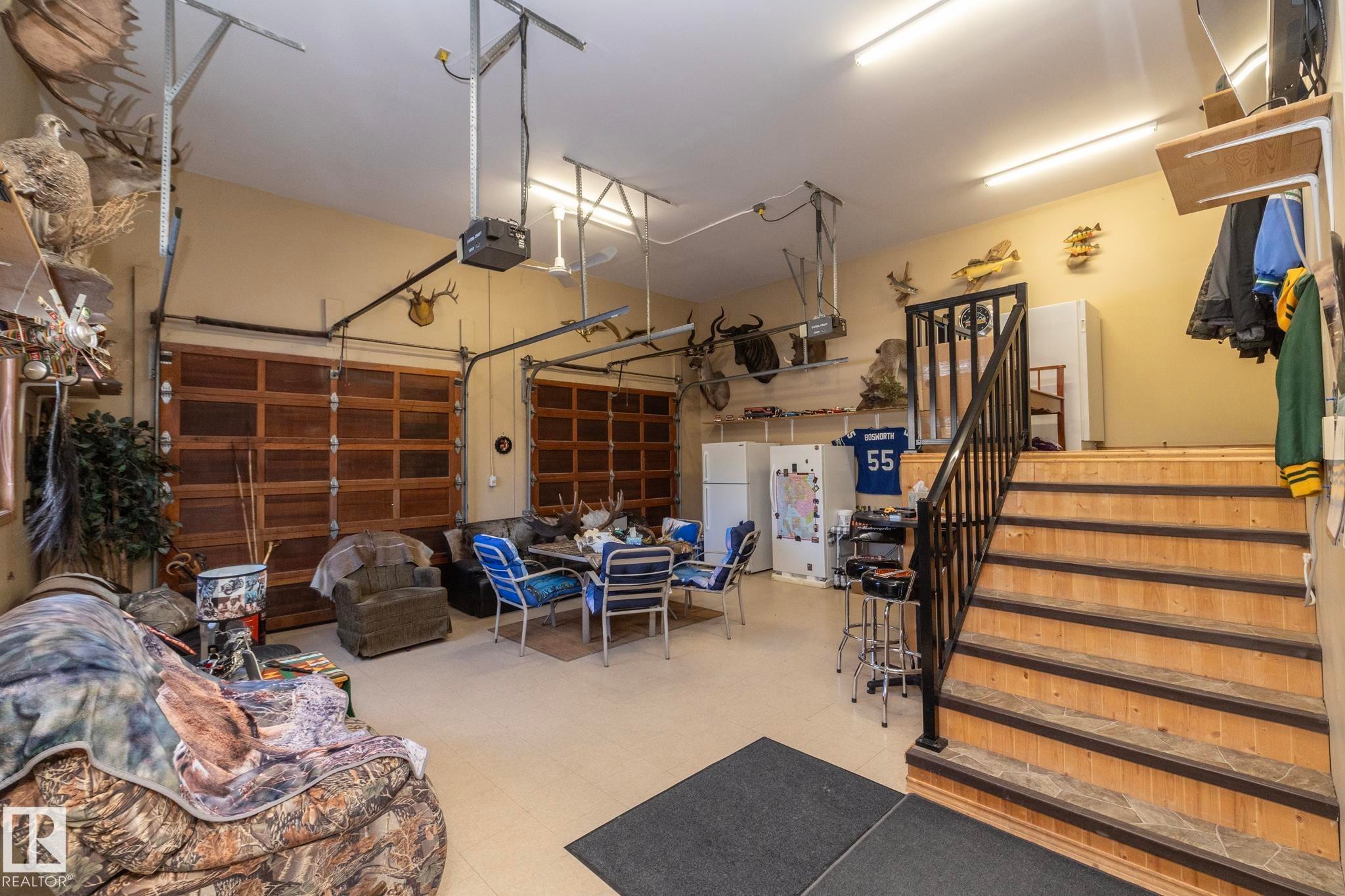 Steps to the house entrance. The furnace and sink area are to the right, just inside the garage side entry door. - 57524 Range Road 270, Rural Westlock County, AB - Indoor Photo Showing Other Room