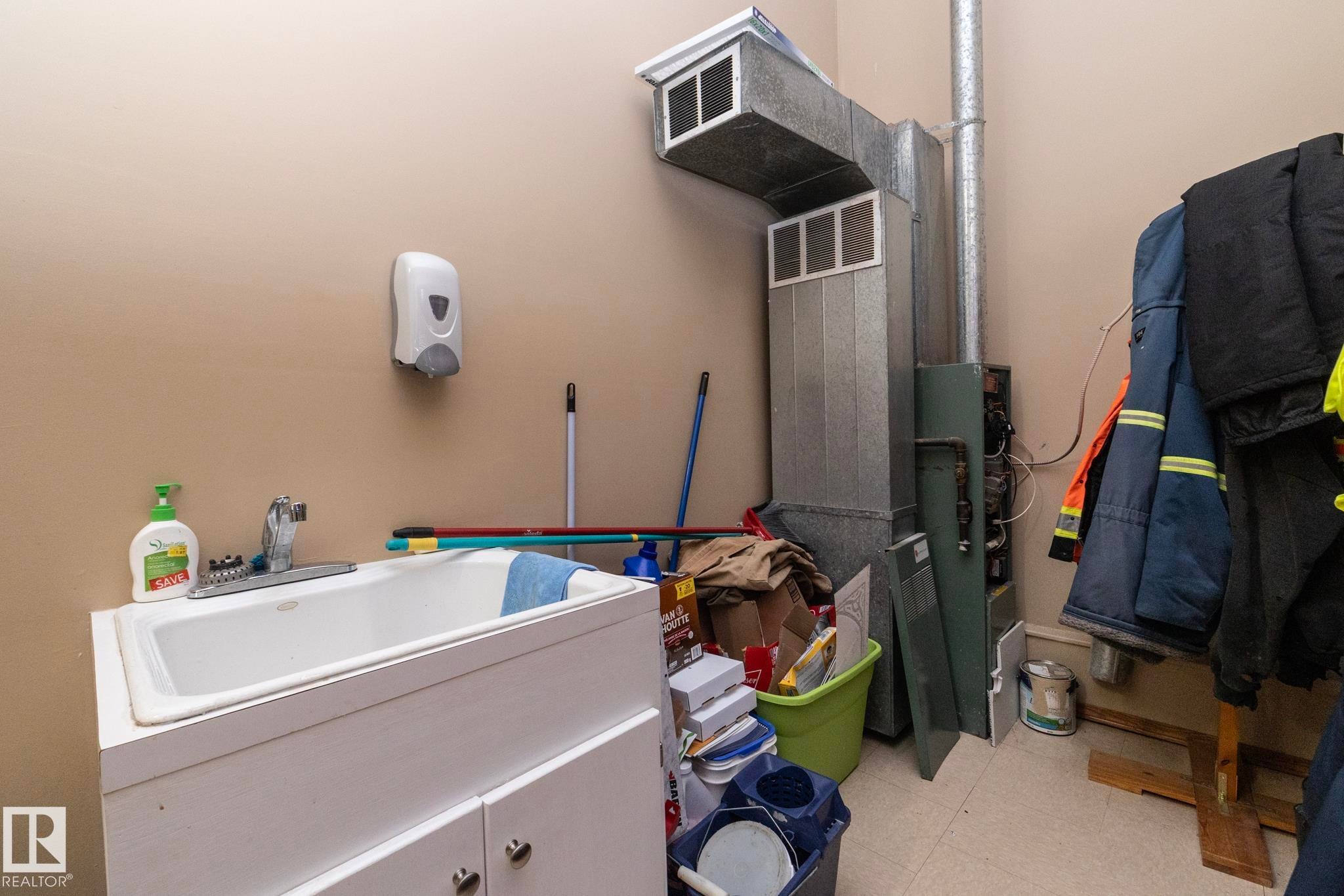 Furnace and wash up area - 57524 Range Road 270, Rural Westlock County, AB - Indoor Photo Showing Laundry Room