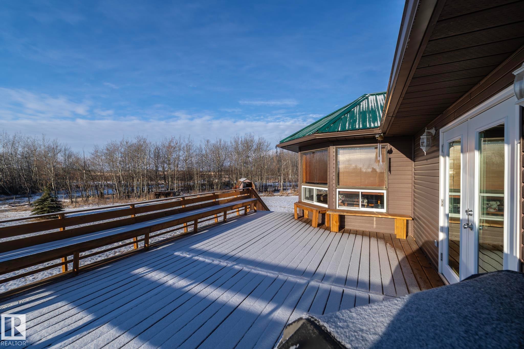 Looking toward the kitchen eating area - 57524 Range Road 270, Rural Westlock County, AB - Outdoor With Deck Patio Veranda With Exterior